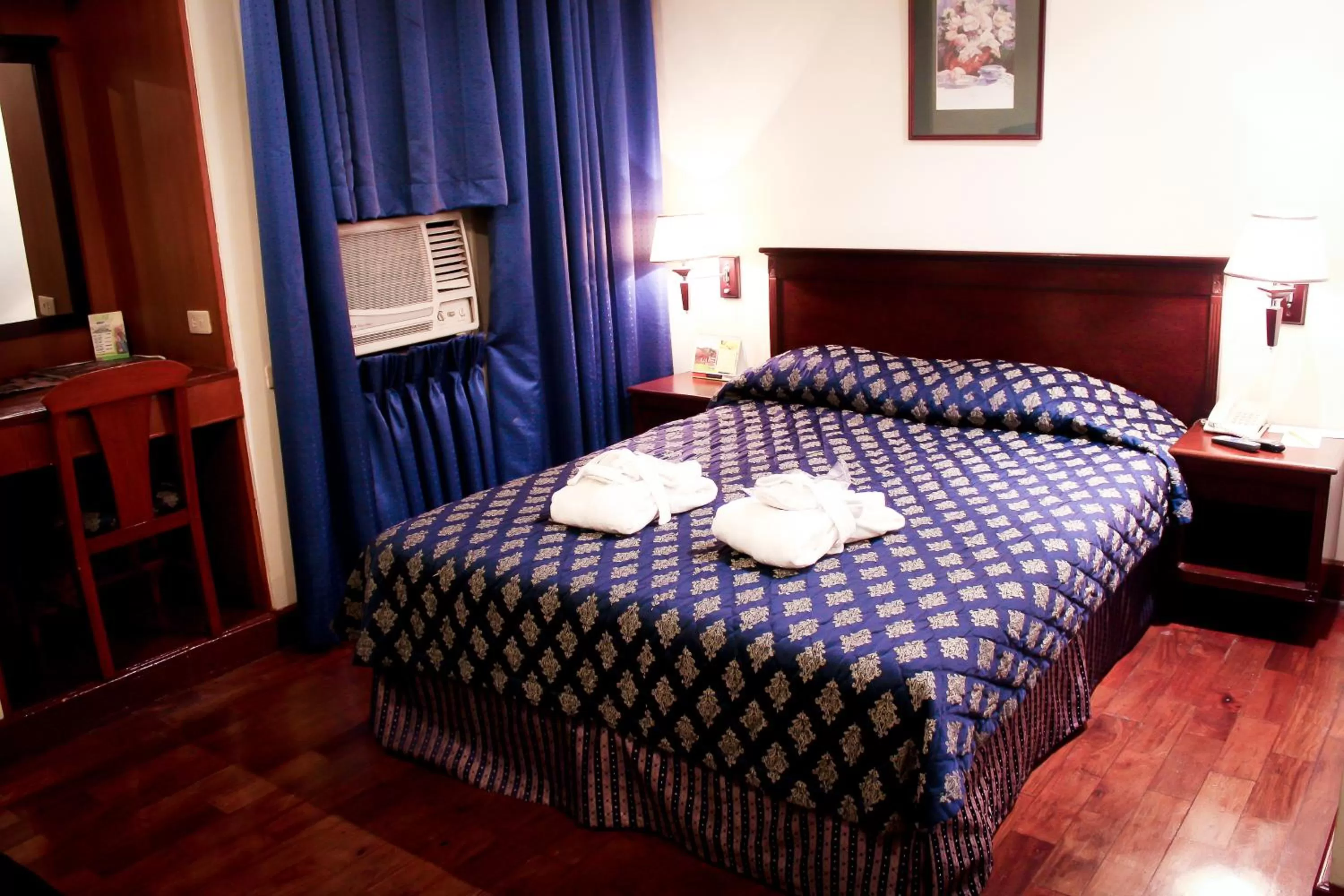 Bed in CityState Tower Hotel