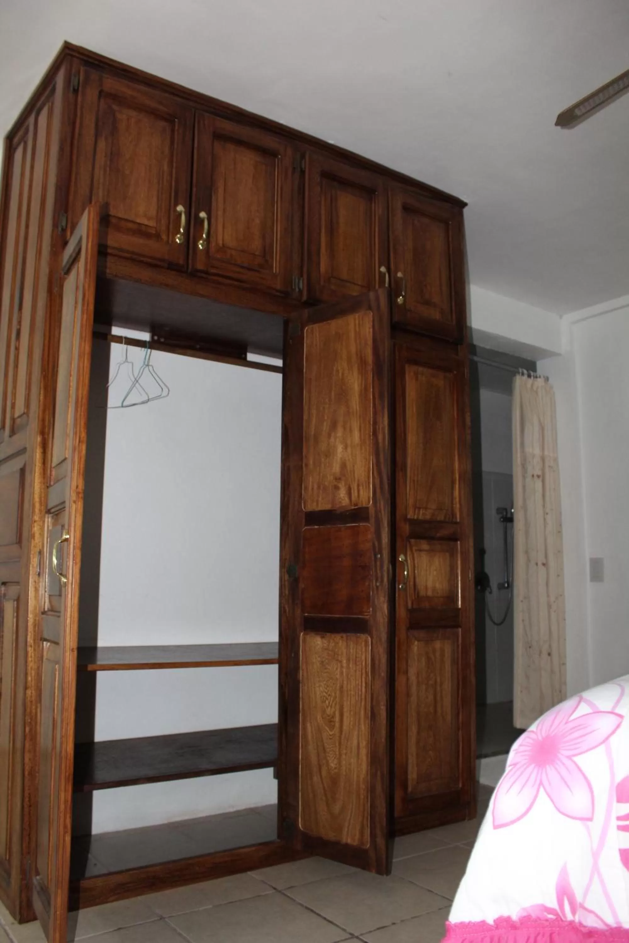 Bedroom, TV/Entertainment Center in Freedom Shores "La Gringa" Hotel - Universally Designed