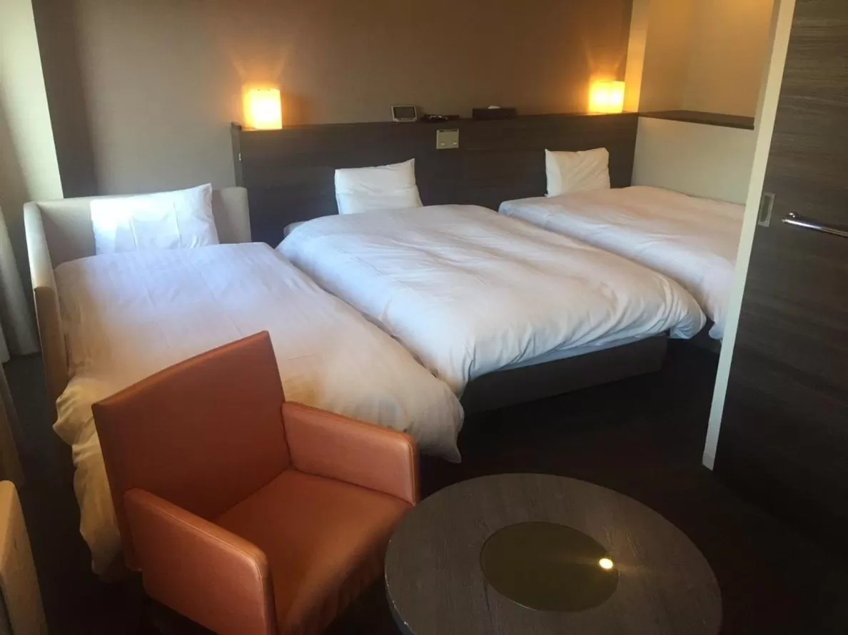 Photo of the whole room, Bed in Dormy Inn Nagasaki Shinchichukagai