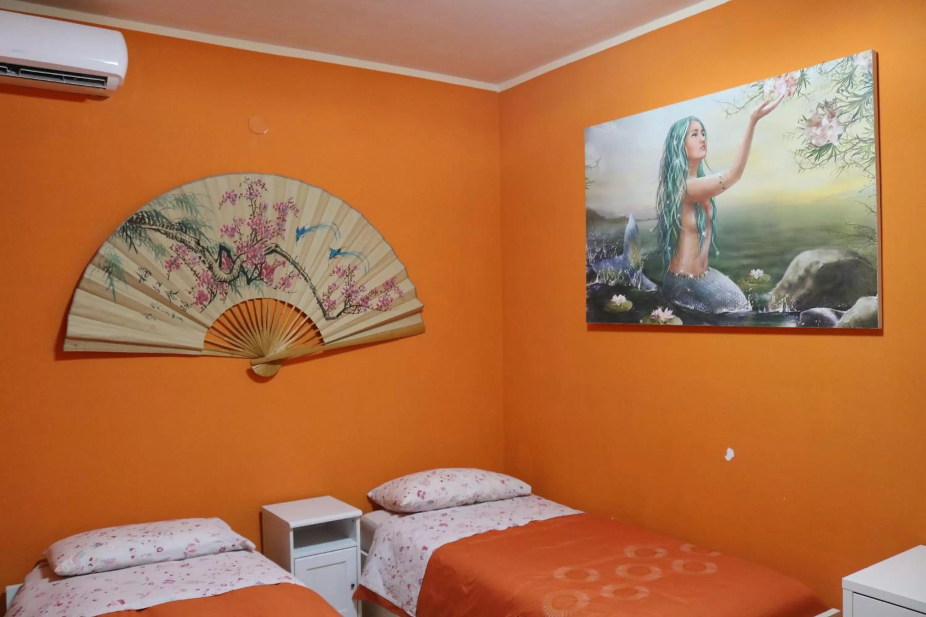 Bed in Le Sirene Bed and Breakfast