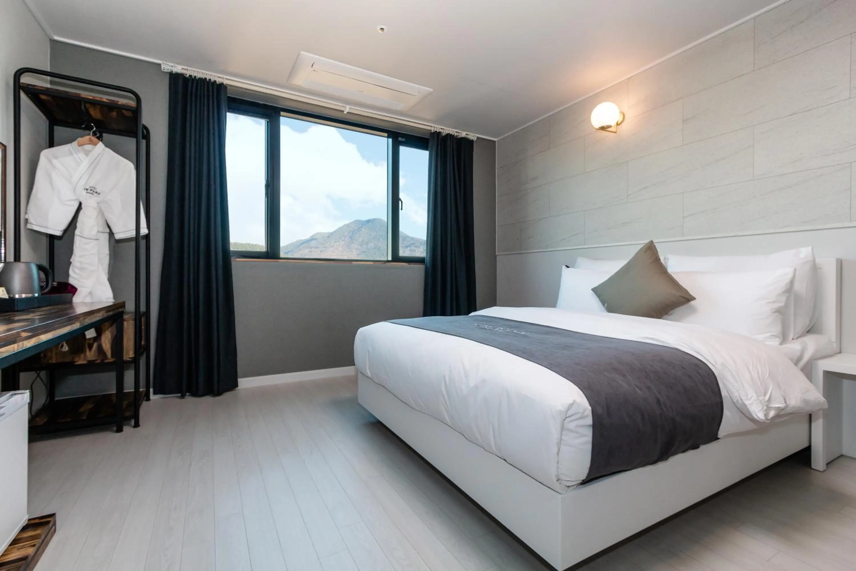 Bed in CM Park Hotel