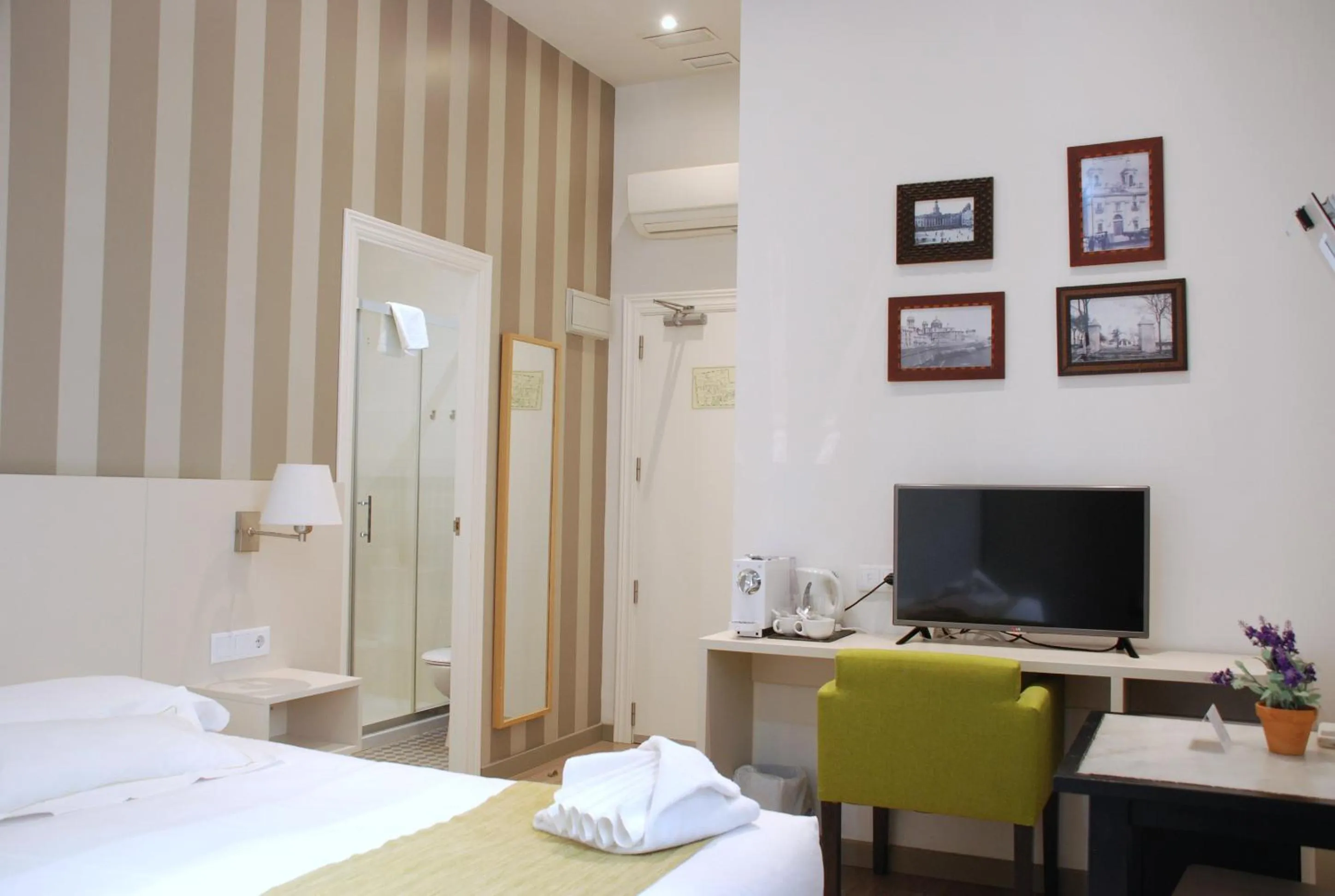 Bed in Hotel San Lorenzo Boutique Plaza