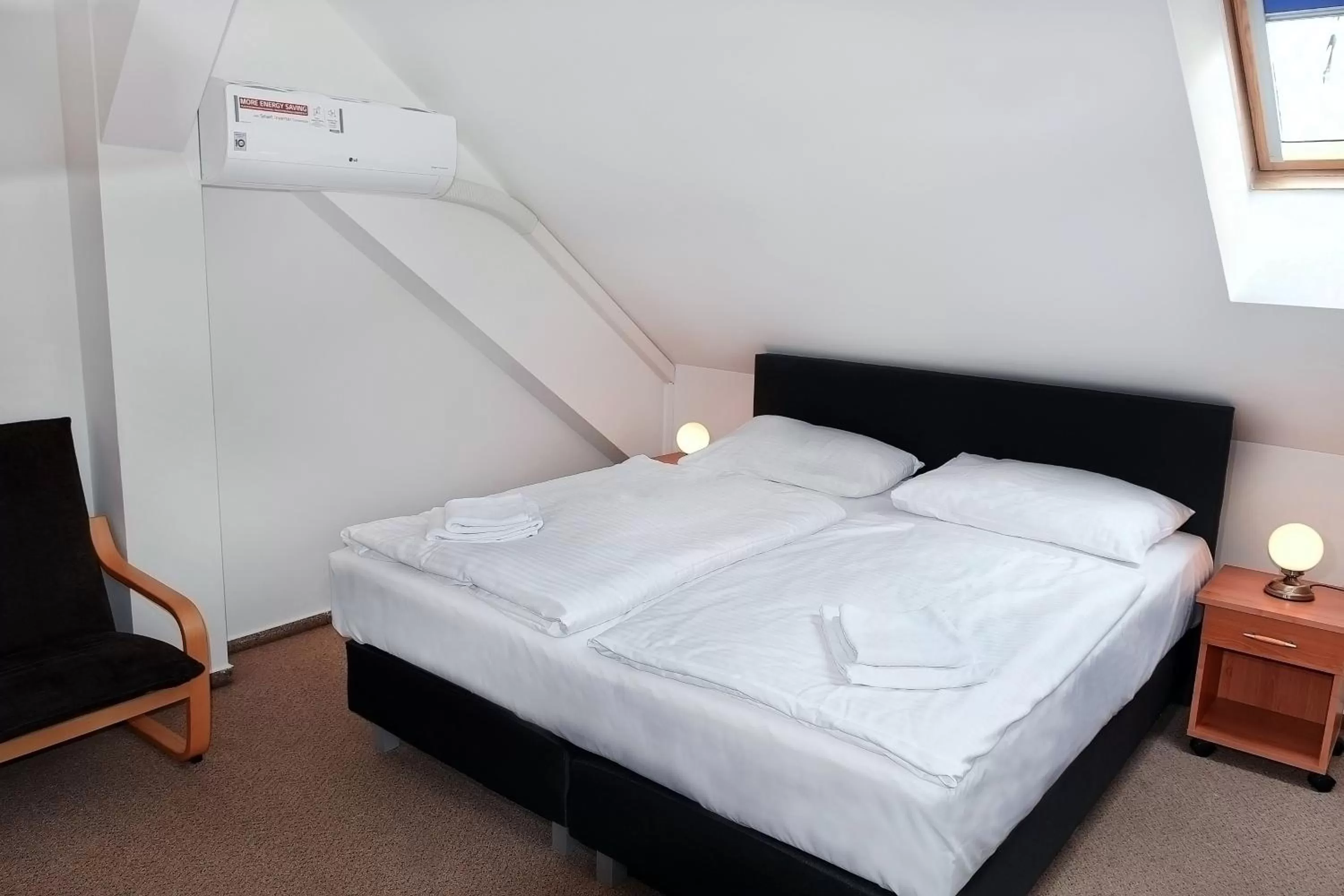 Bed in Hotel Bílý Koníček