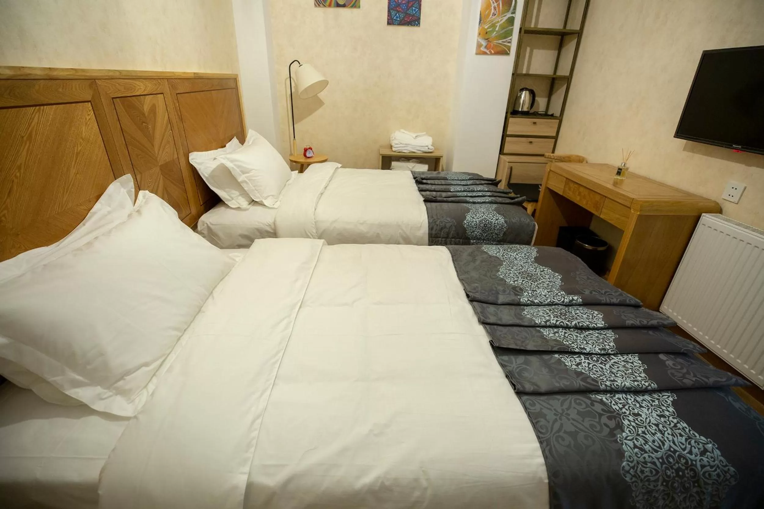 Communal lounge/ TV room, Bed in Ornament Boutique Hotel