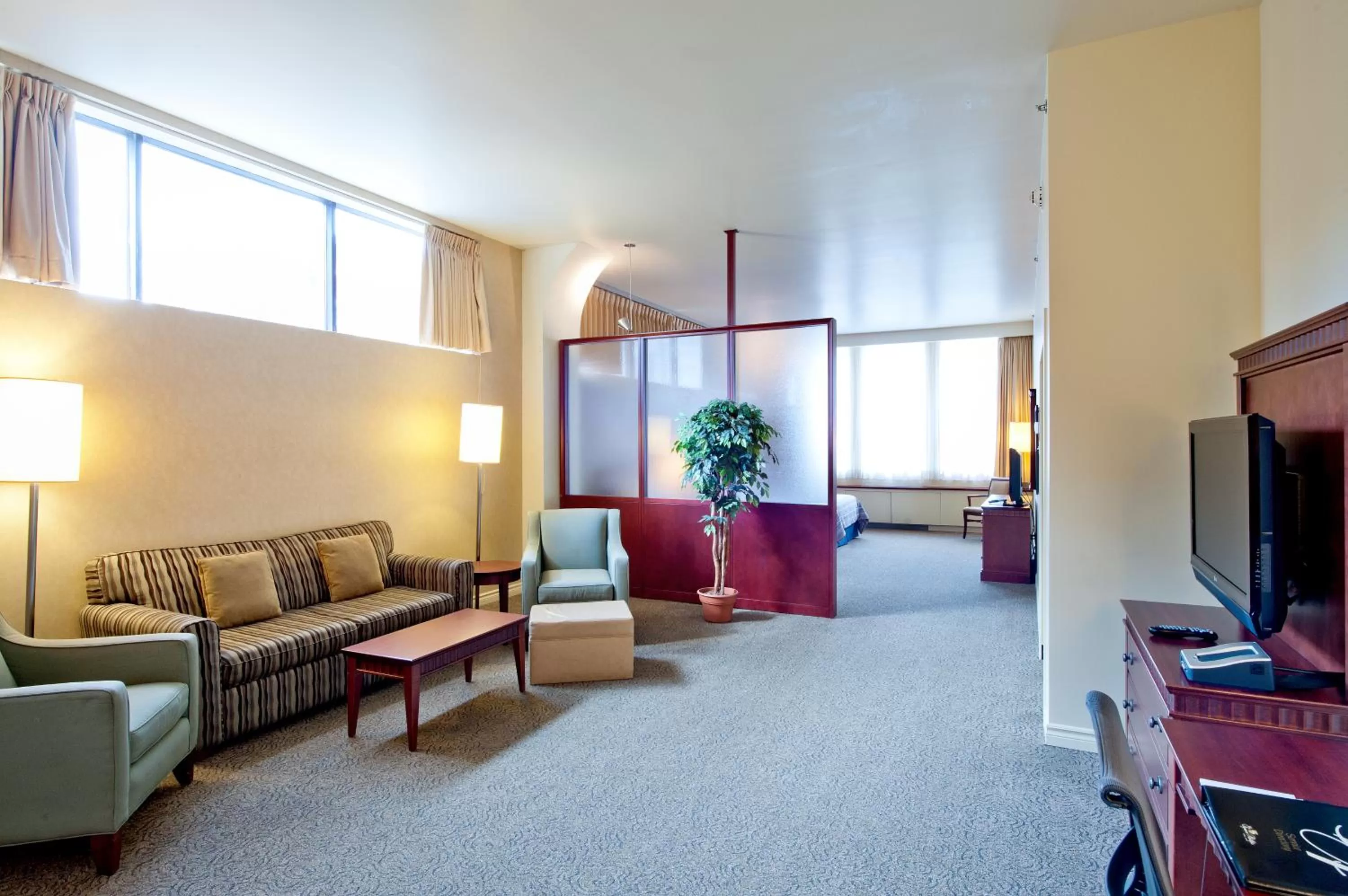 Living room in Le Square Phillips Hôtel & Suites