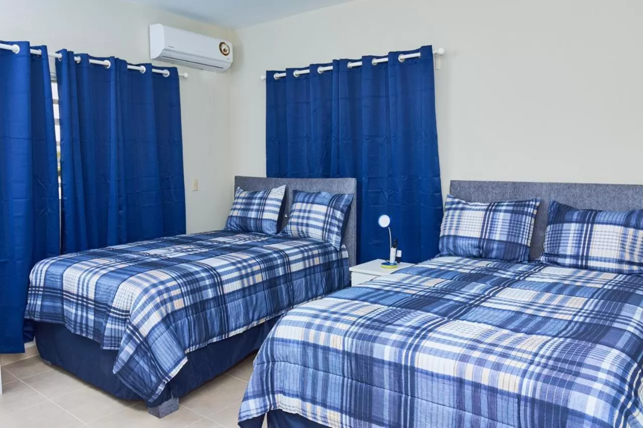 Bed in Apartahotel MACADANA