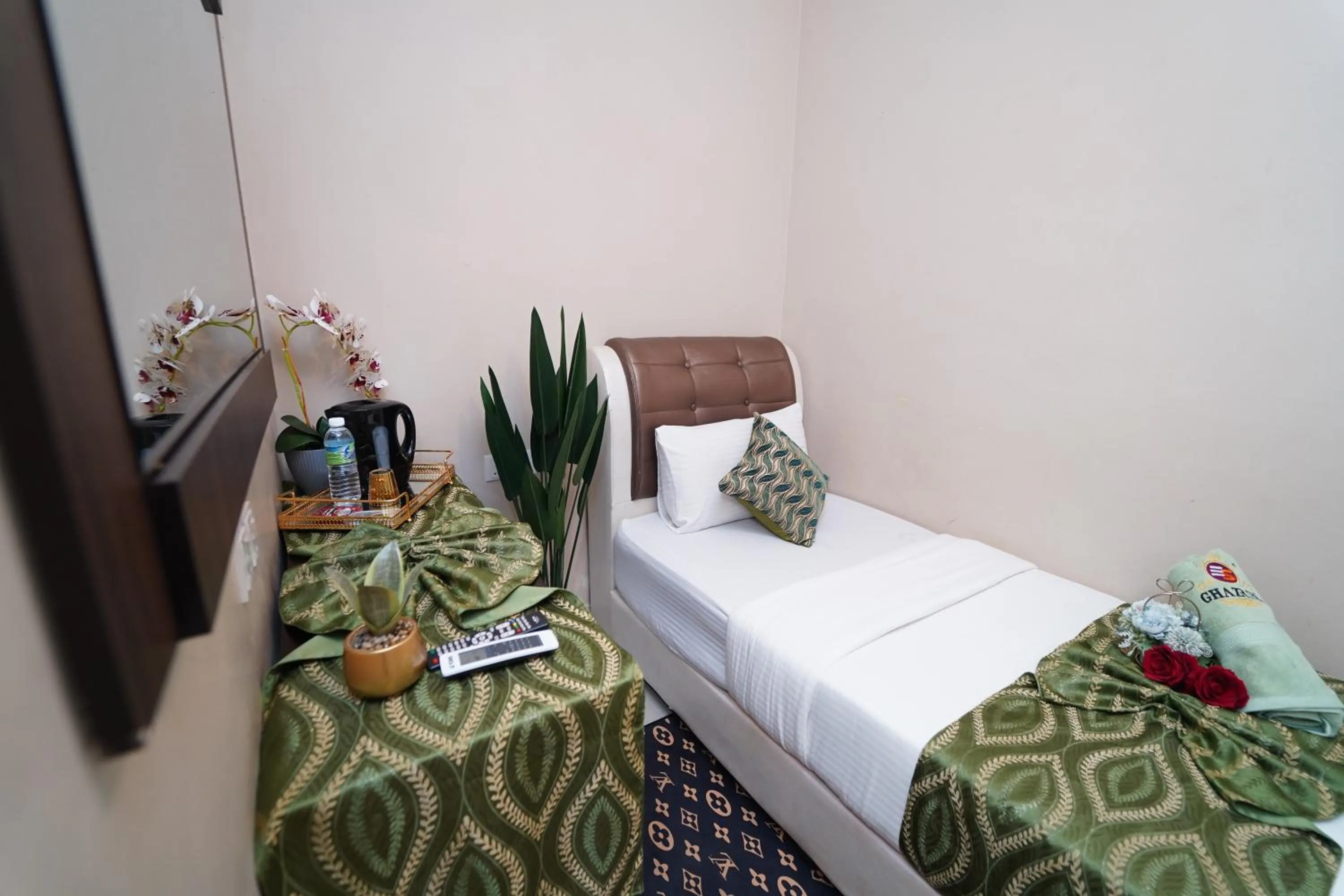 Bed in Ghazrin's Classic Hotel JB