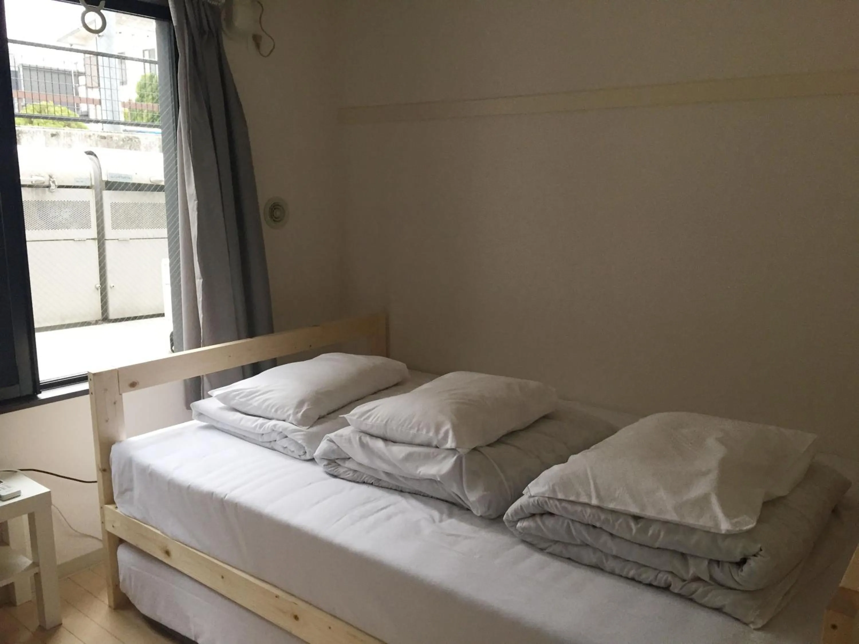 Bed in Sophiearth Apartment