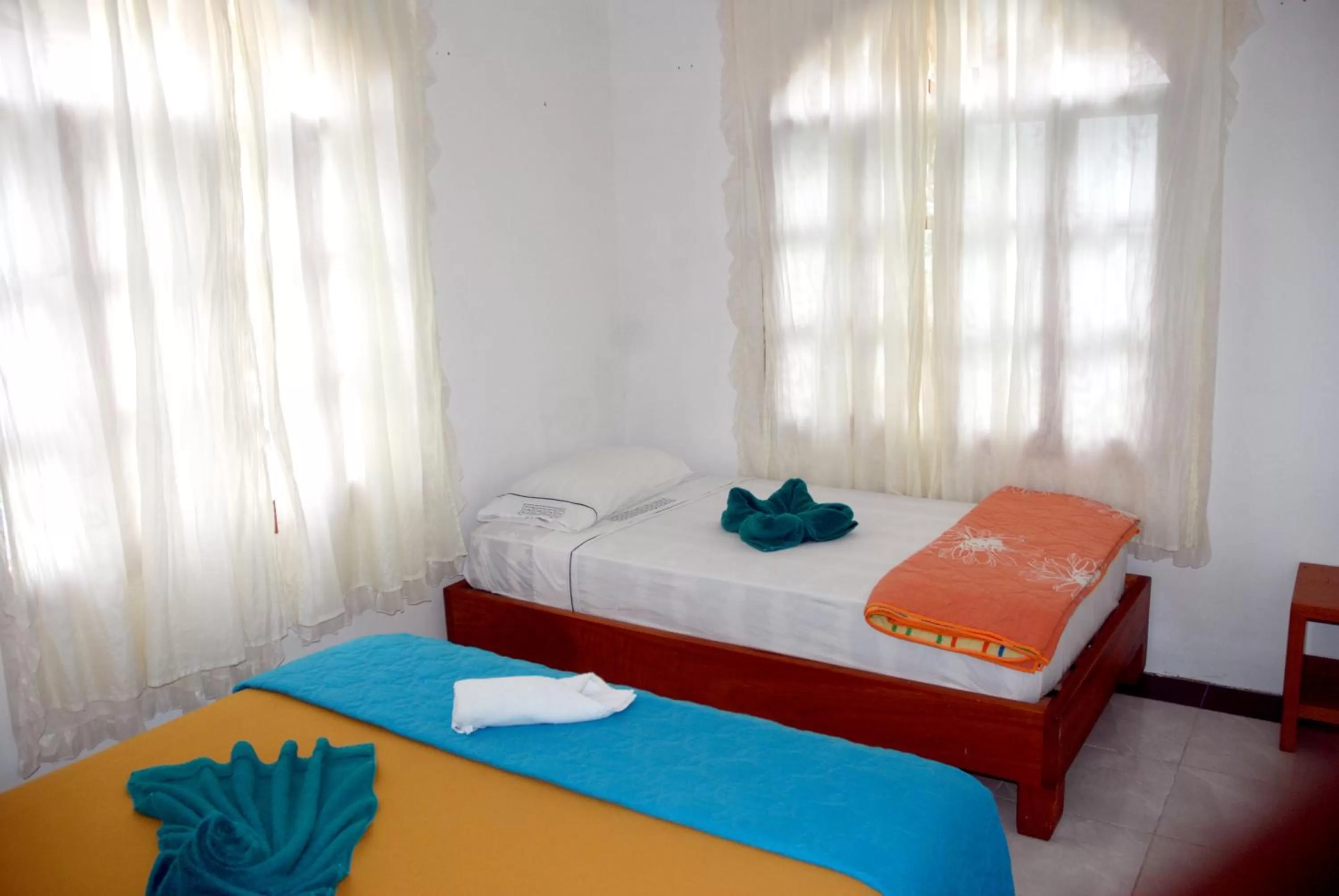 Bed in The Galapagos Pearl B&B