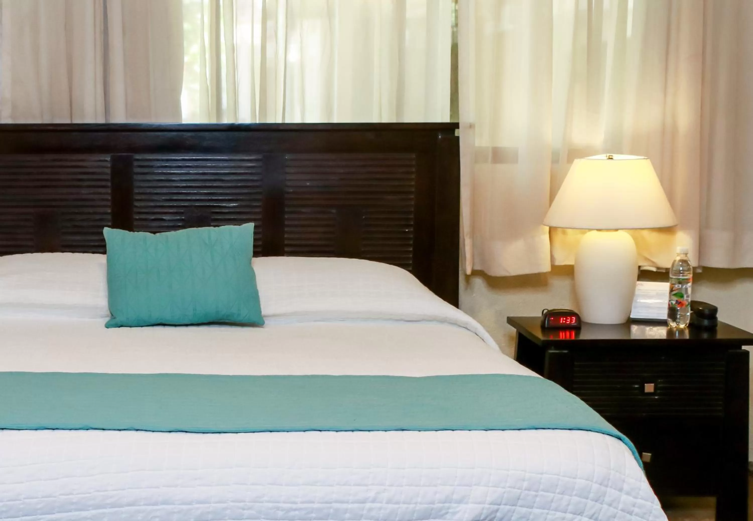 Bed in Las Magnolias Hotel Boutique