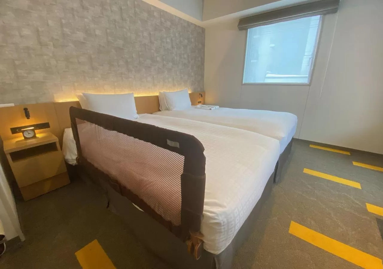 Bed in Tokyu Stay Sapporo Odori