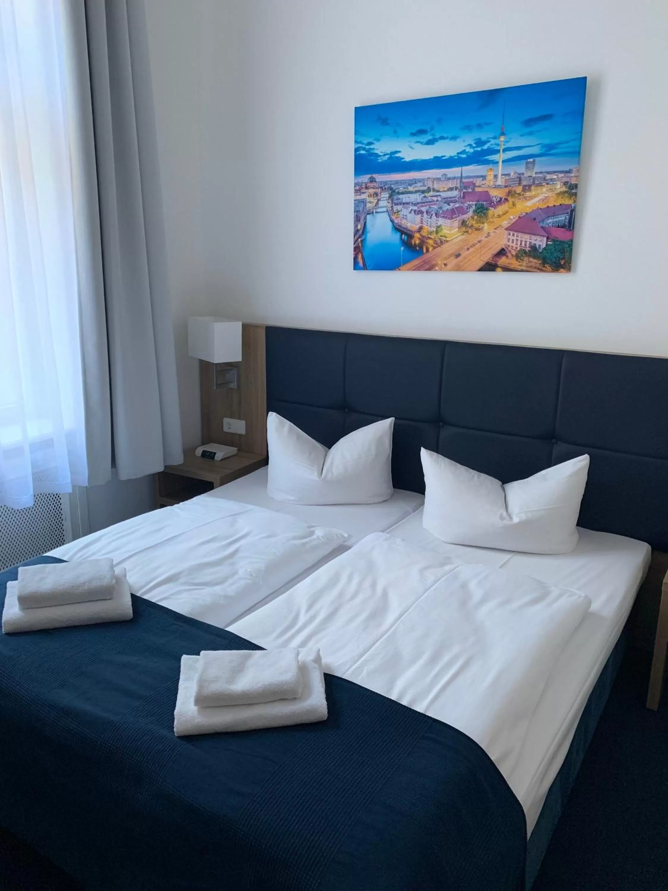 Bed in Hotel Seifert Berlin am Kurfürstendamm