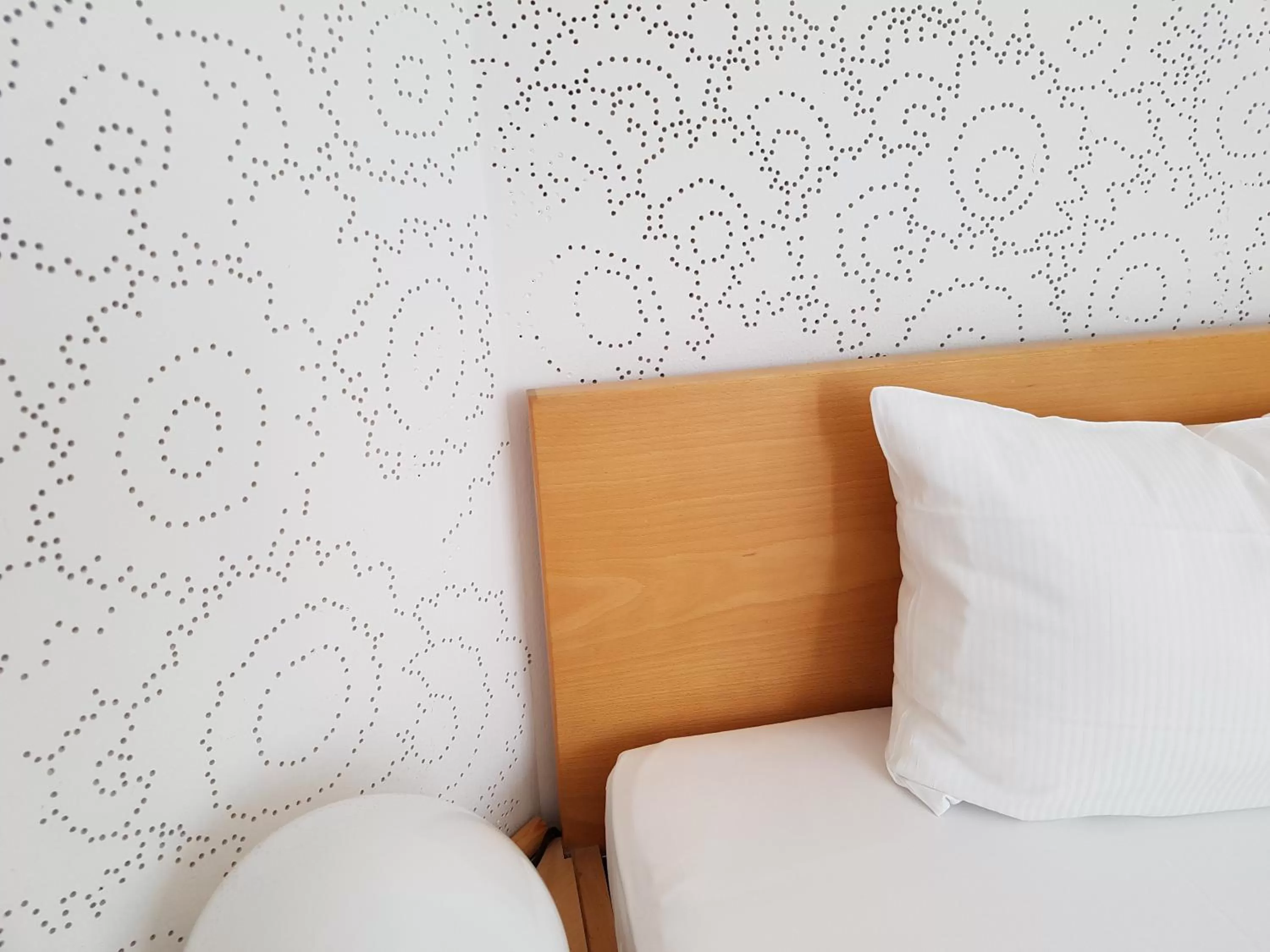 Bed in Art-Hotel Robert Mayer