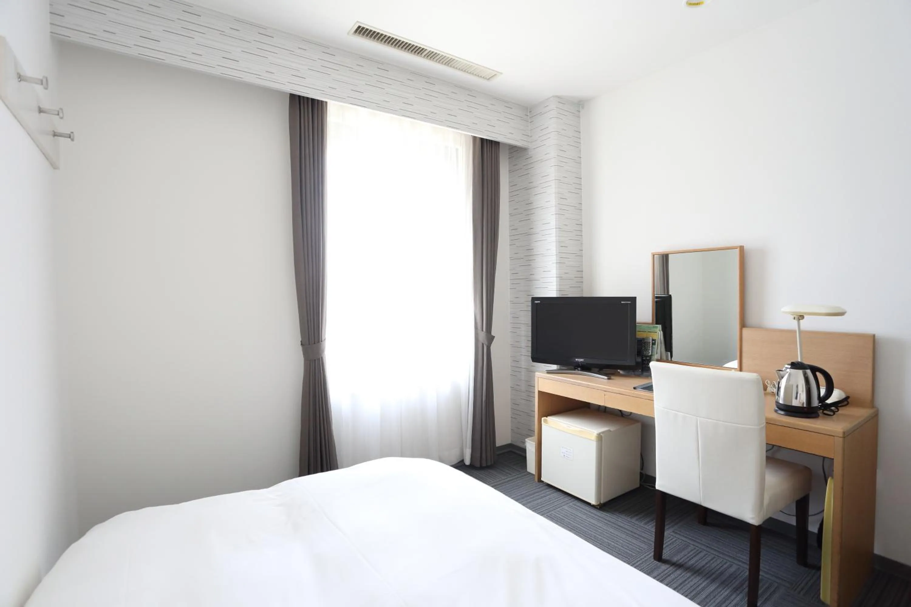 Bed in Hotel International House Osaka