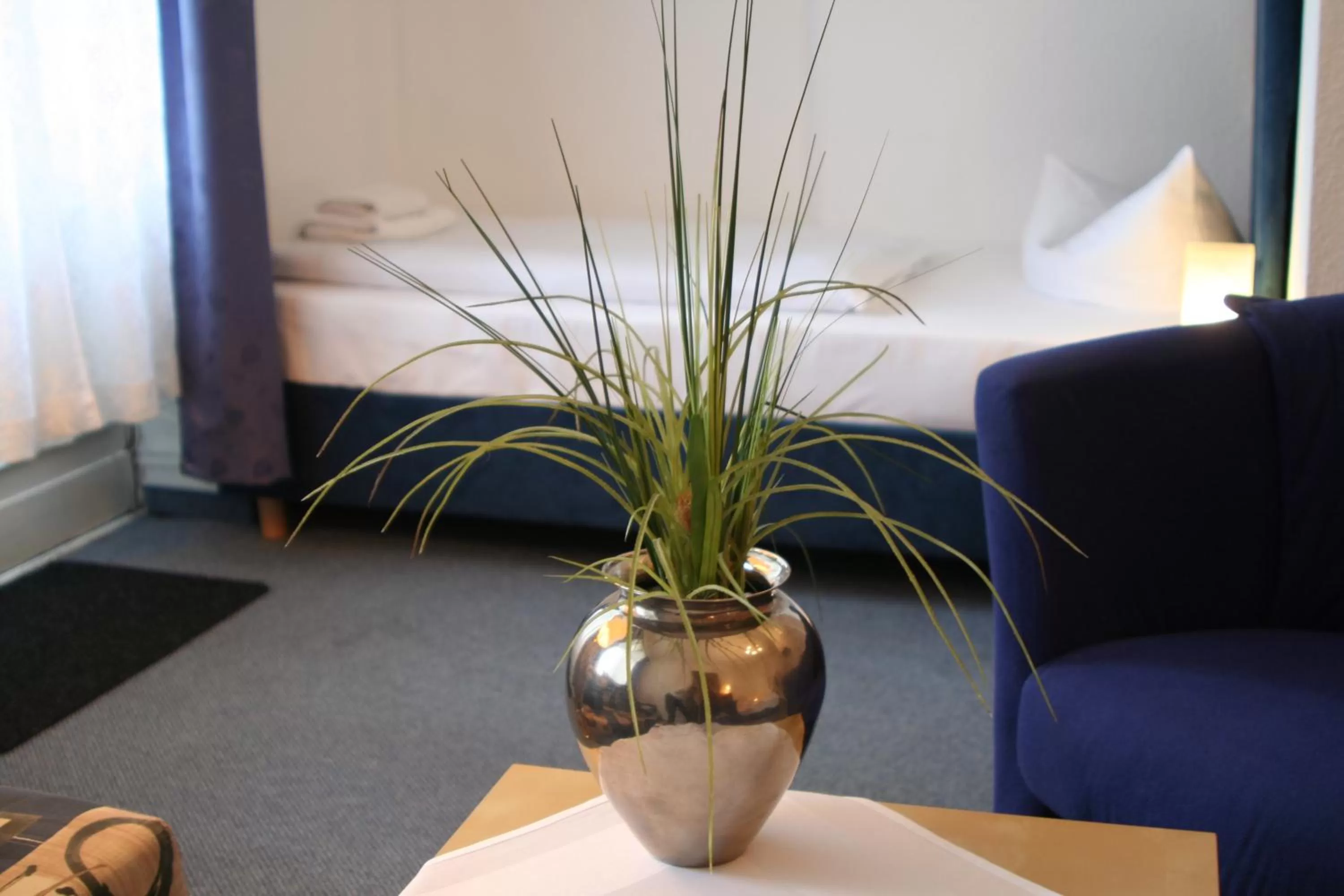 Bed in Hotel Seifert Berlin am Kurfürstendamm