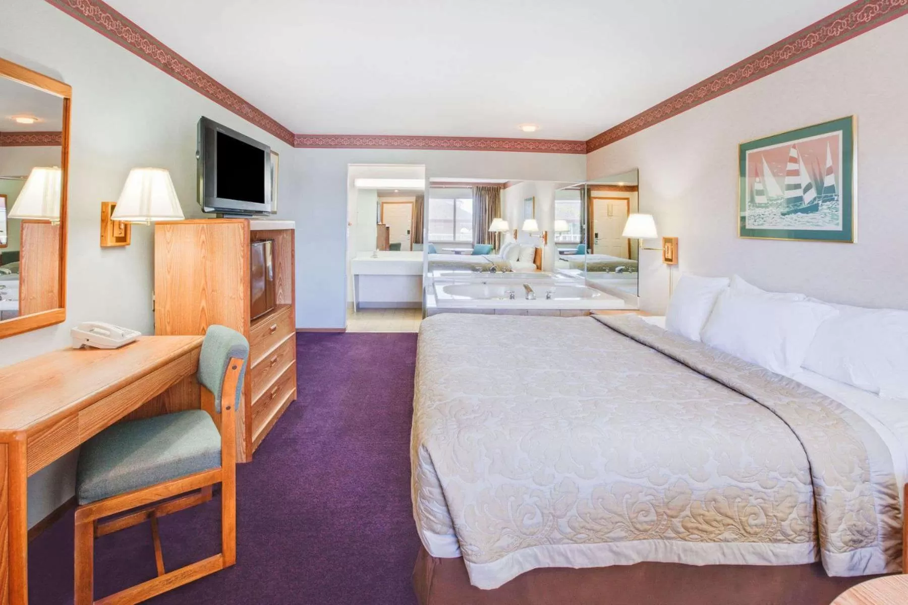 Photo of the whole room, Bed in Super 8 Beachfront by Wyndham Mackinaw City, MI