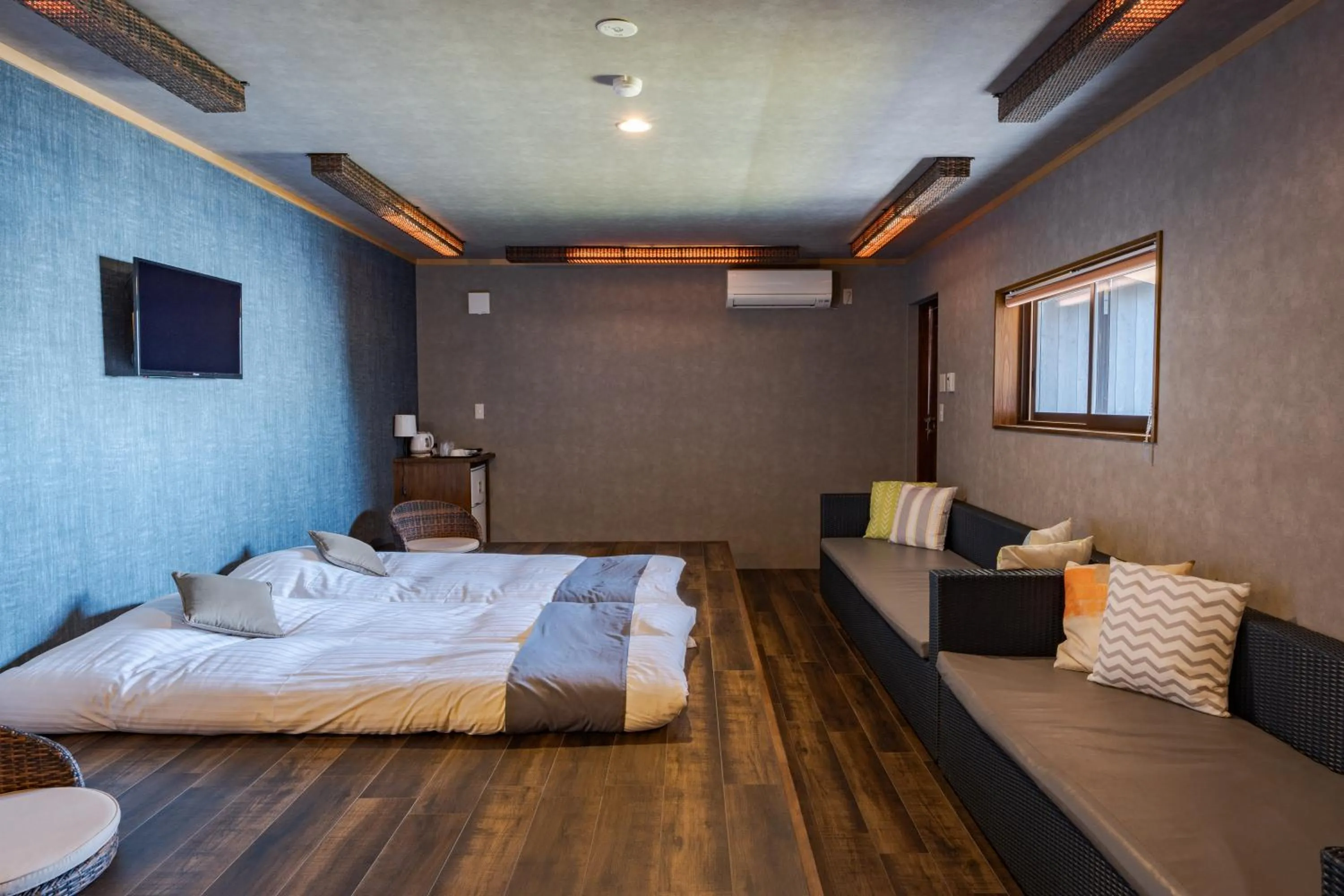 Bed in XYZ Private Spa and Seaside Resort