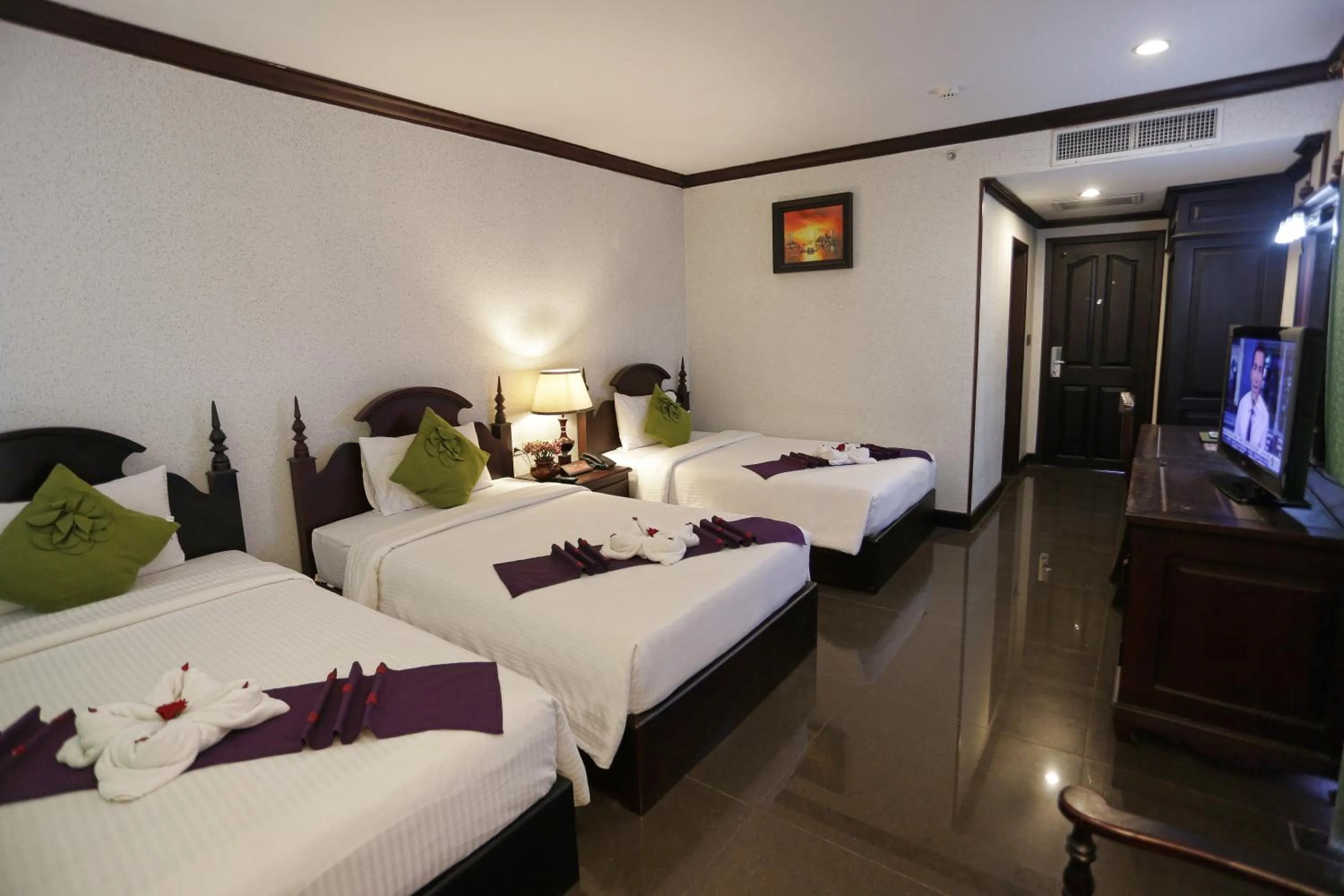 Bed in Lucky Angkor Hotel & Spa