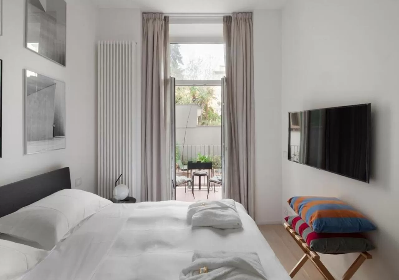 Bed in BB Hotels Aparthotel Collection Il Michelangelo