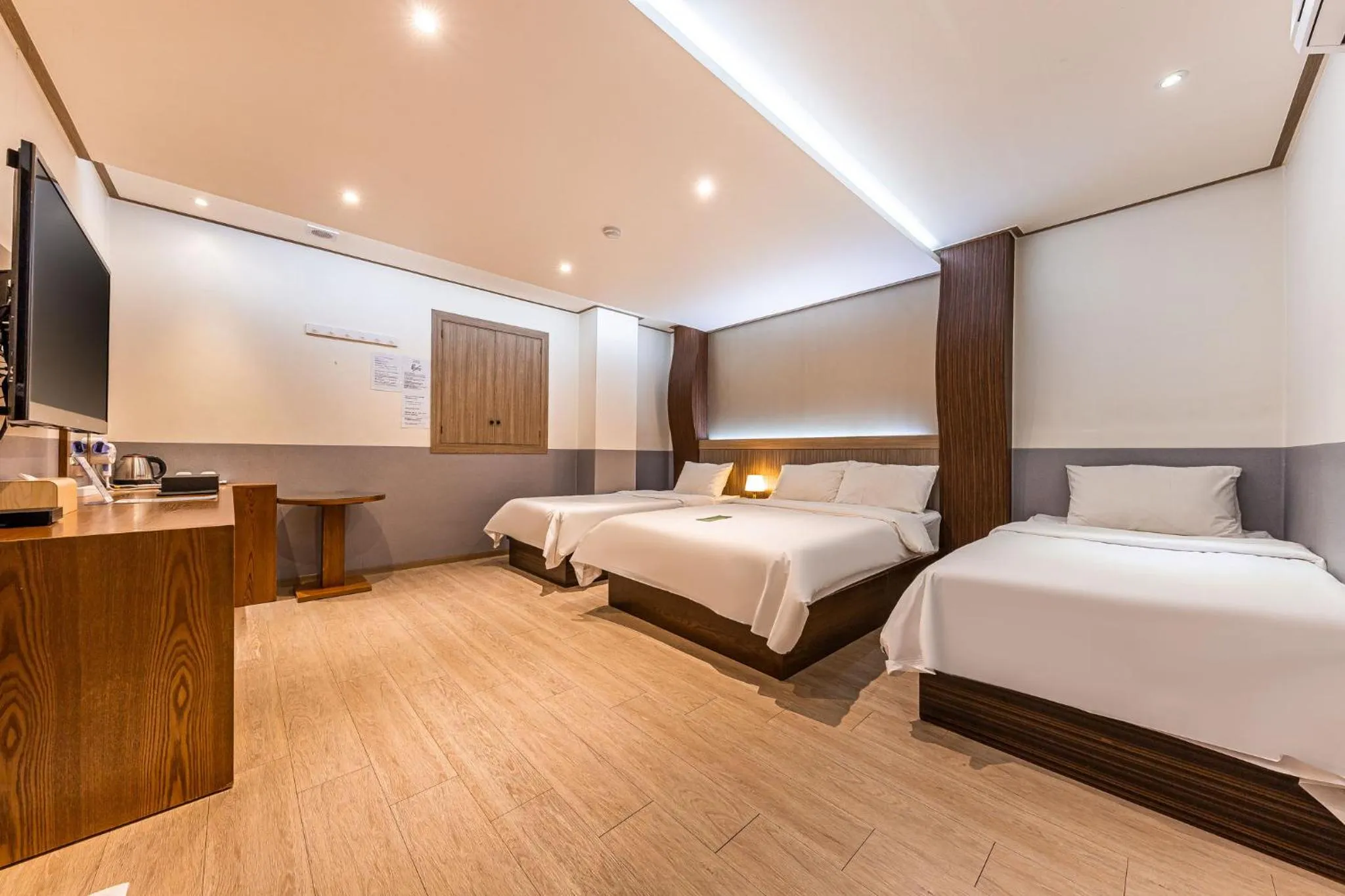 Bed in Friendly DH Naissance Hotel by Mindrum Group