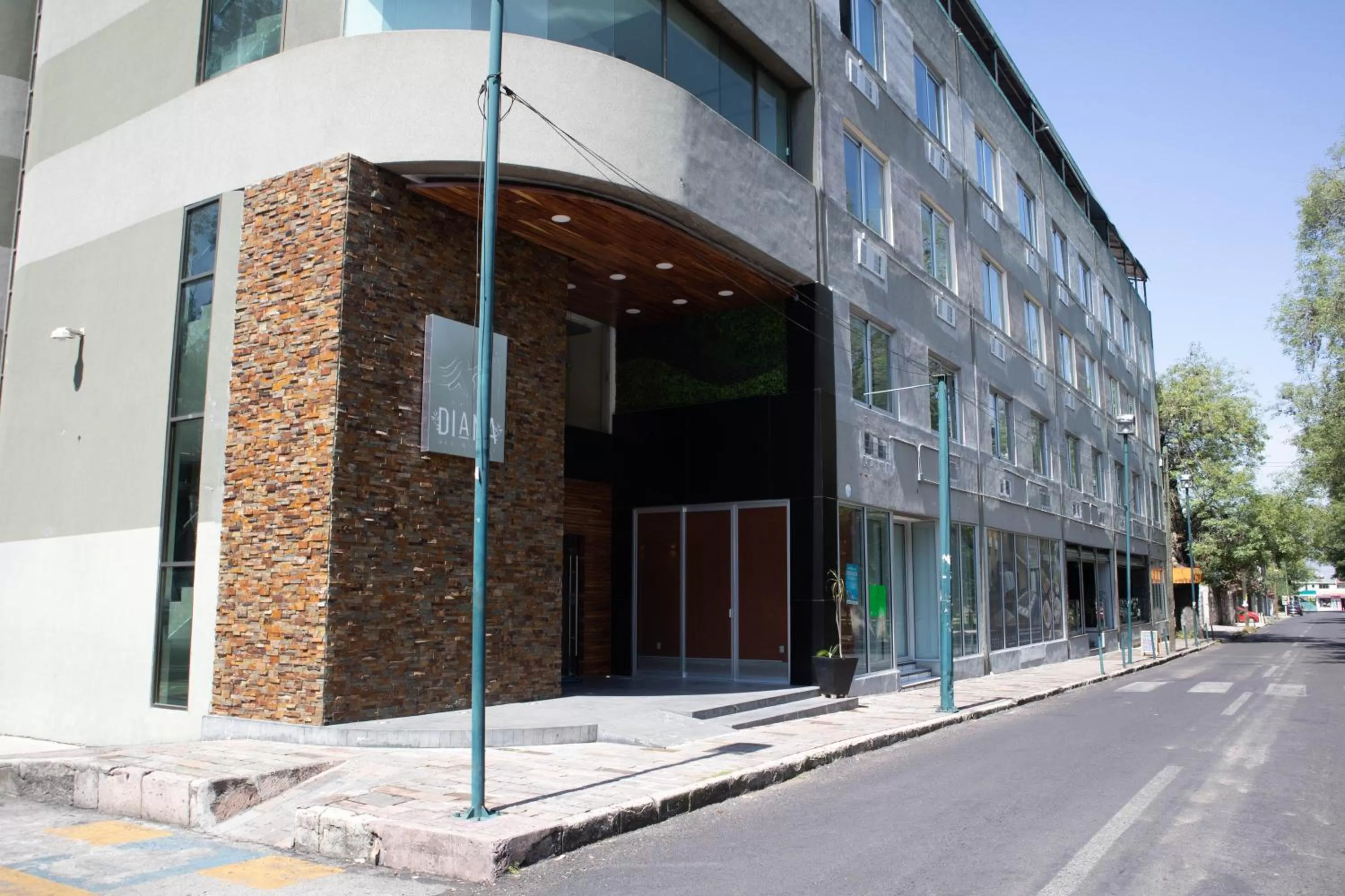 Property building in Hotel Diana del Bosque by DOT Urban