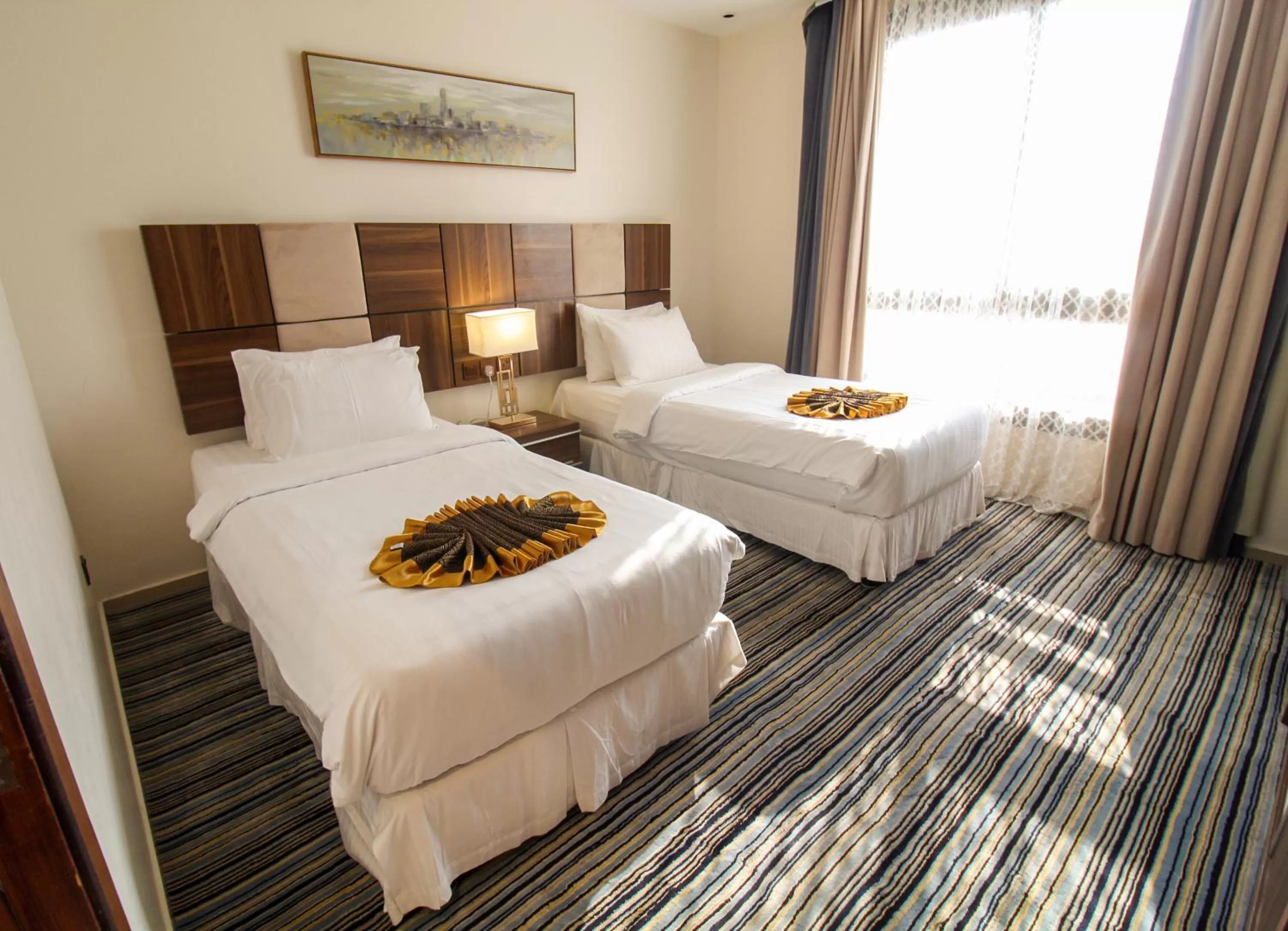 Bed in Friesian Hotel Suites