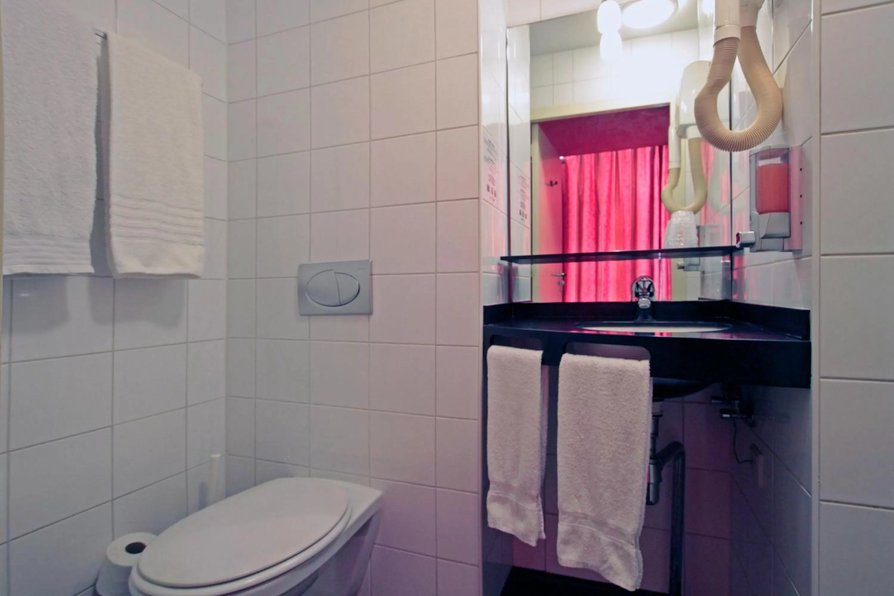 Bathroom in A-Train Hotel