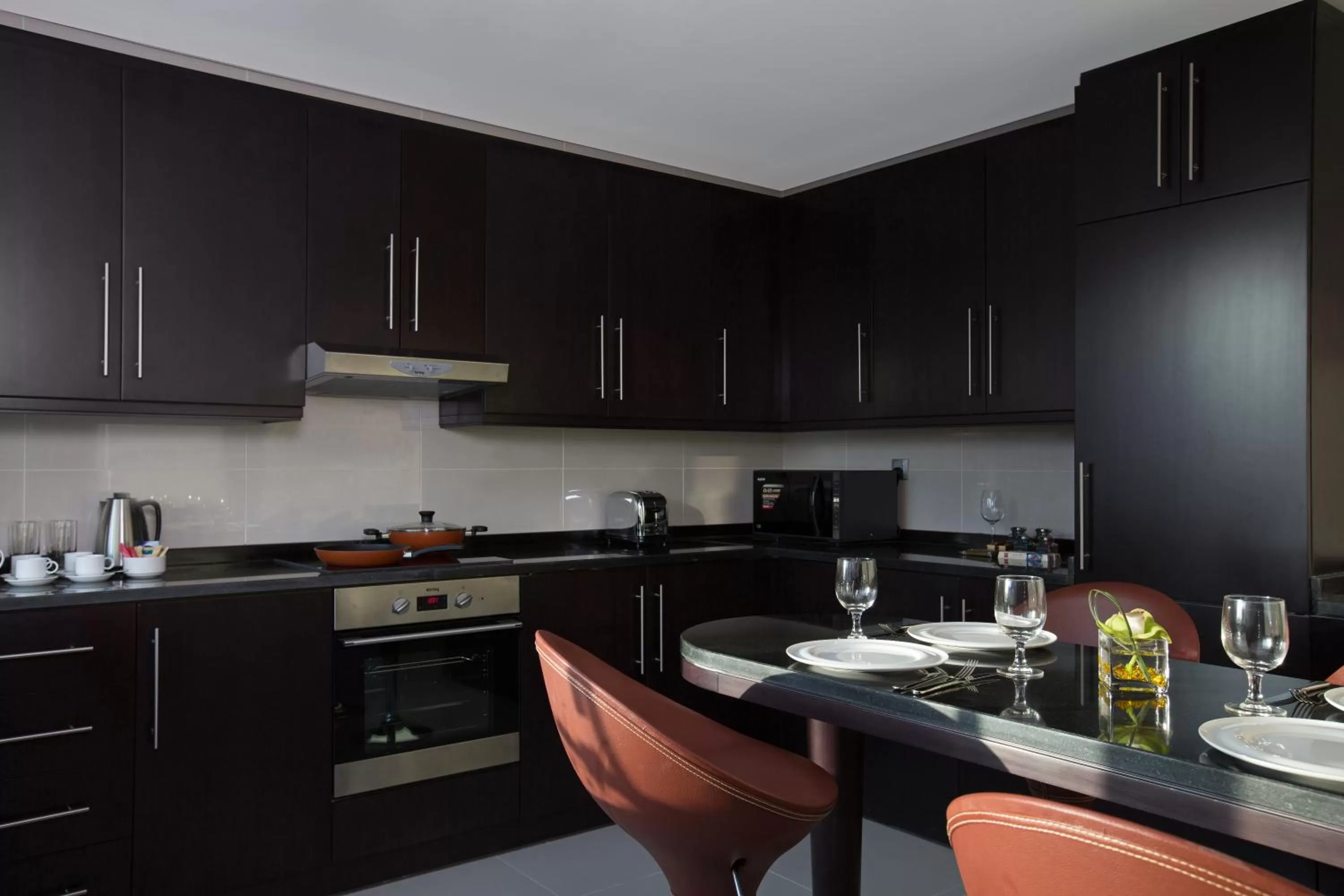 Kitchen or kitchenette in Pullman Dubai Jumeirah Lakes Towers