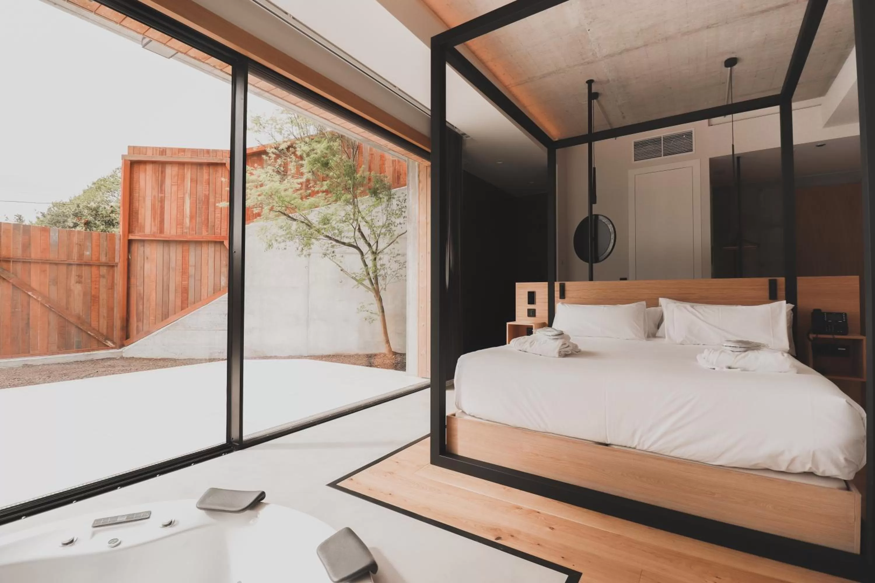 Bed in Atmos Hotel Boutique