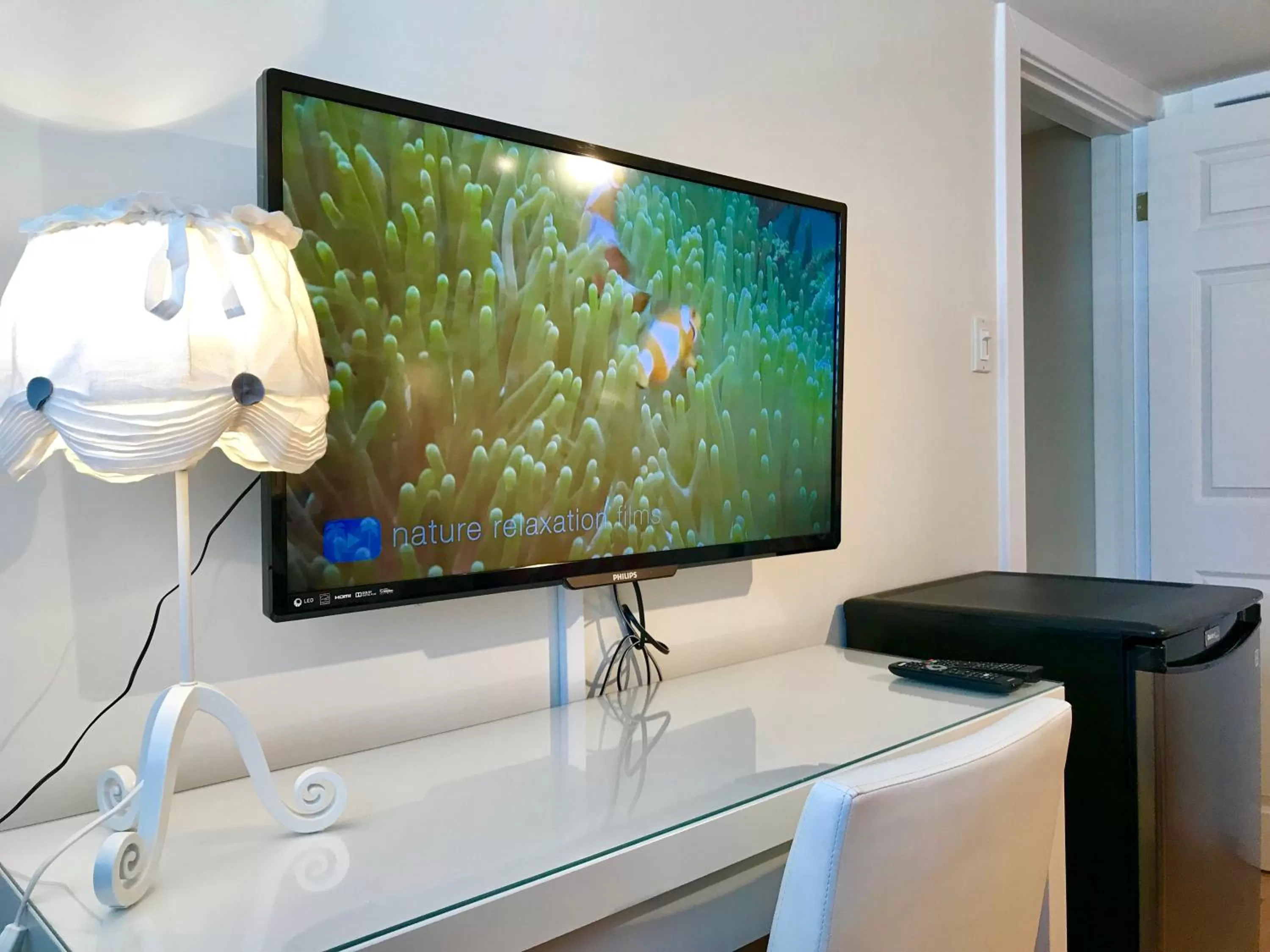 TV and multimedia, TV/Entertainment Center in Auberge Tom B&B