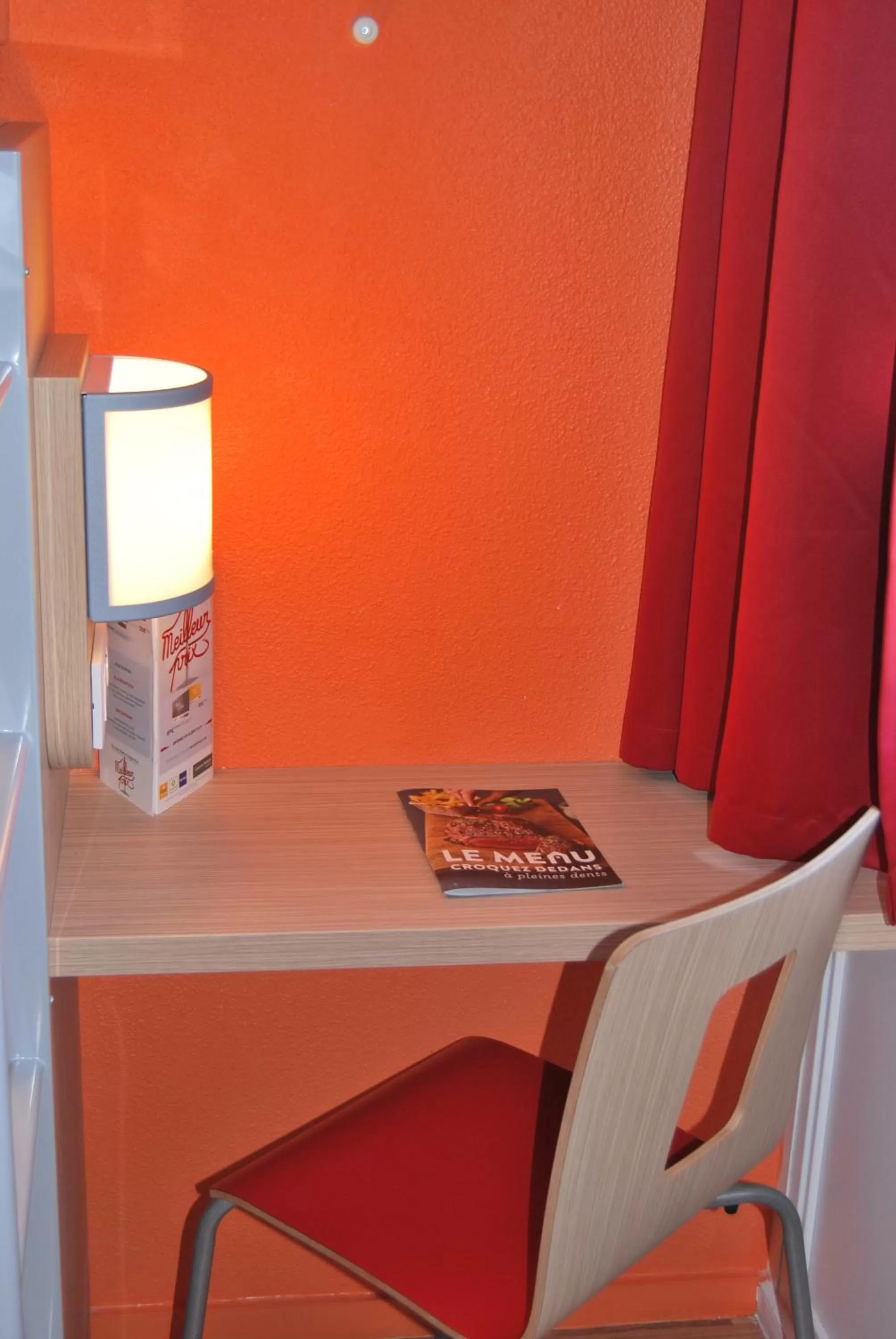 Seating area in Premiere Classe Vannes