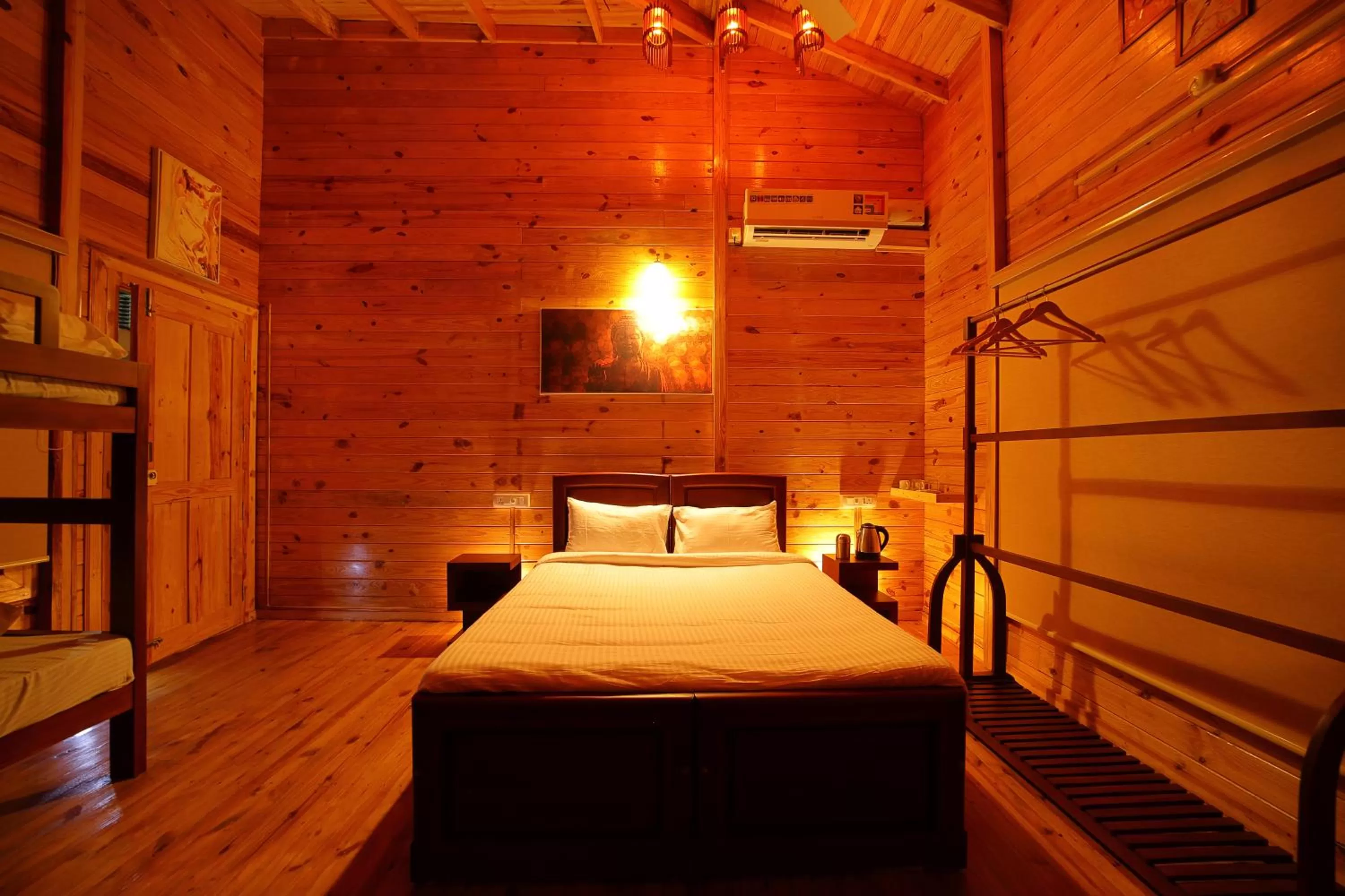 Bed in Woodrose Resort