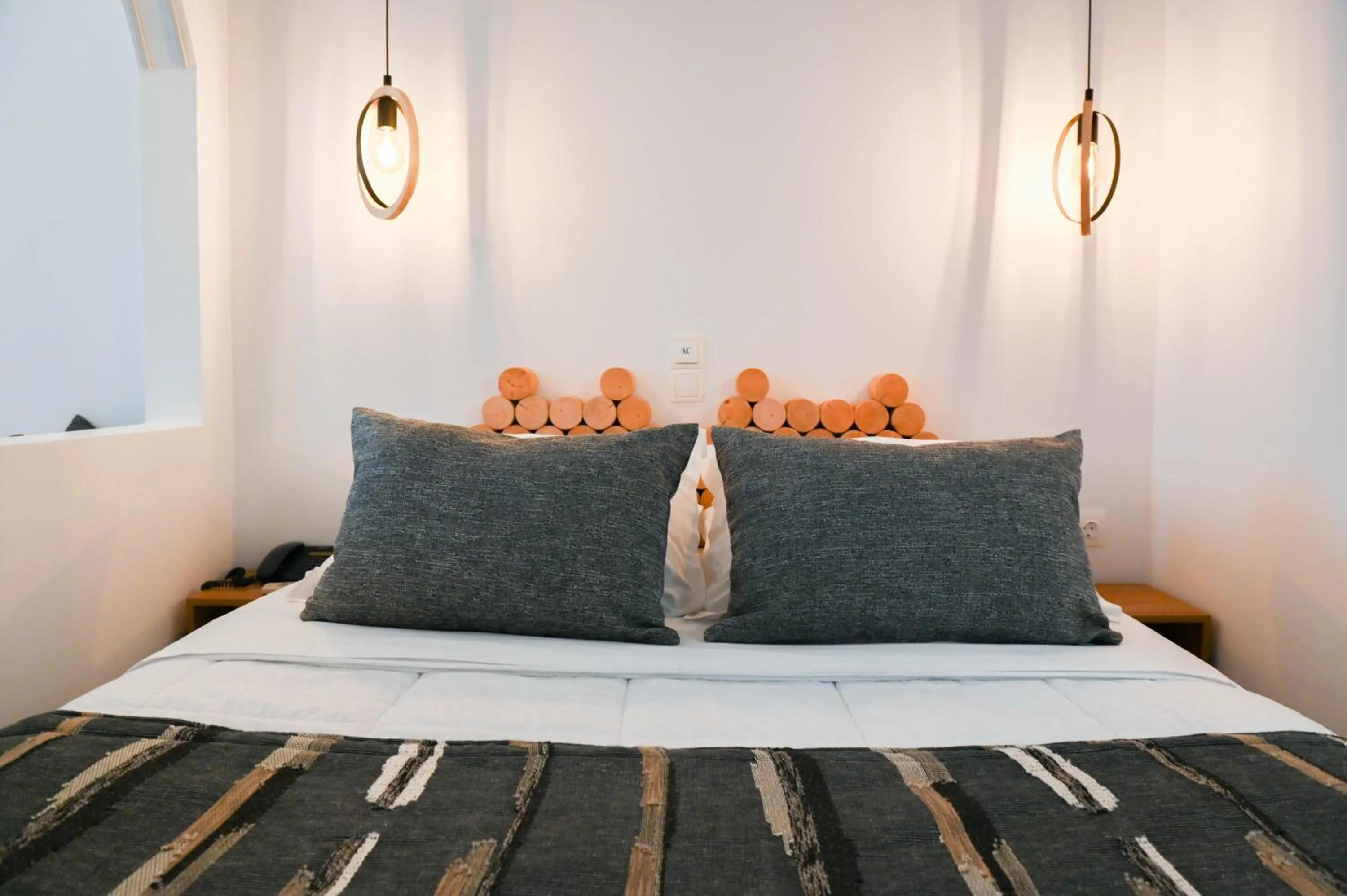 Bed in Amerisa Suites & Villa