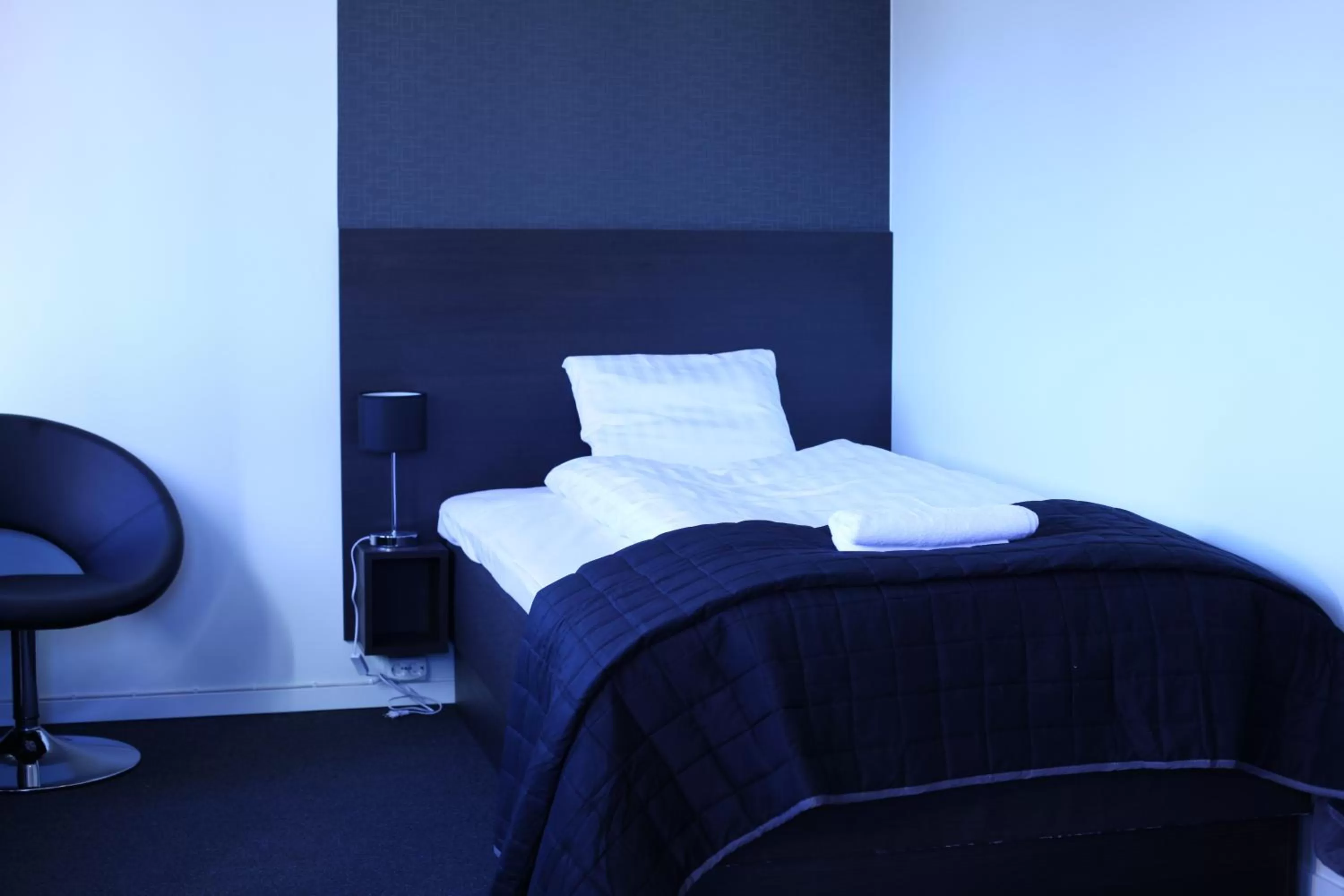 Photo of the whole room, Bed in Nacka Stadshotell