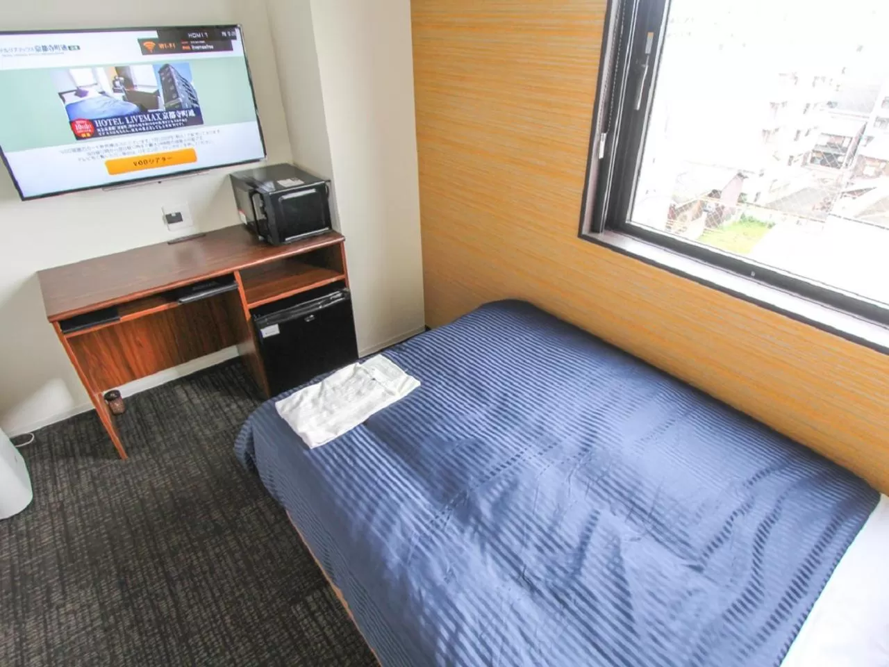 Bed in HOTEL LiVEMAX Kyoto Teramachidori