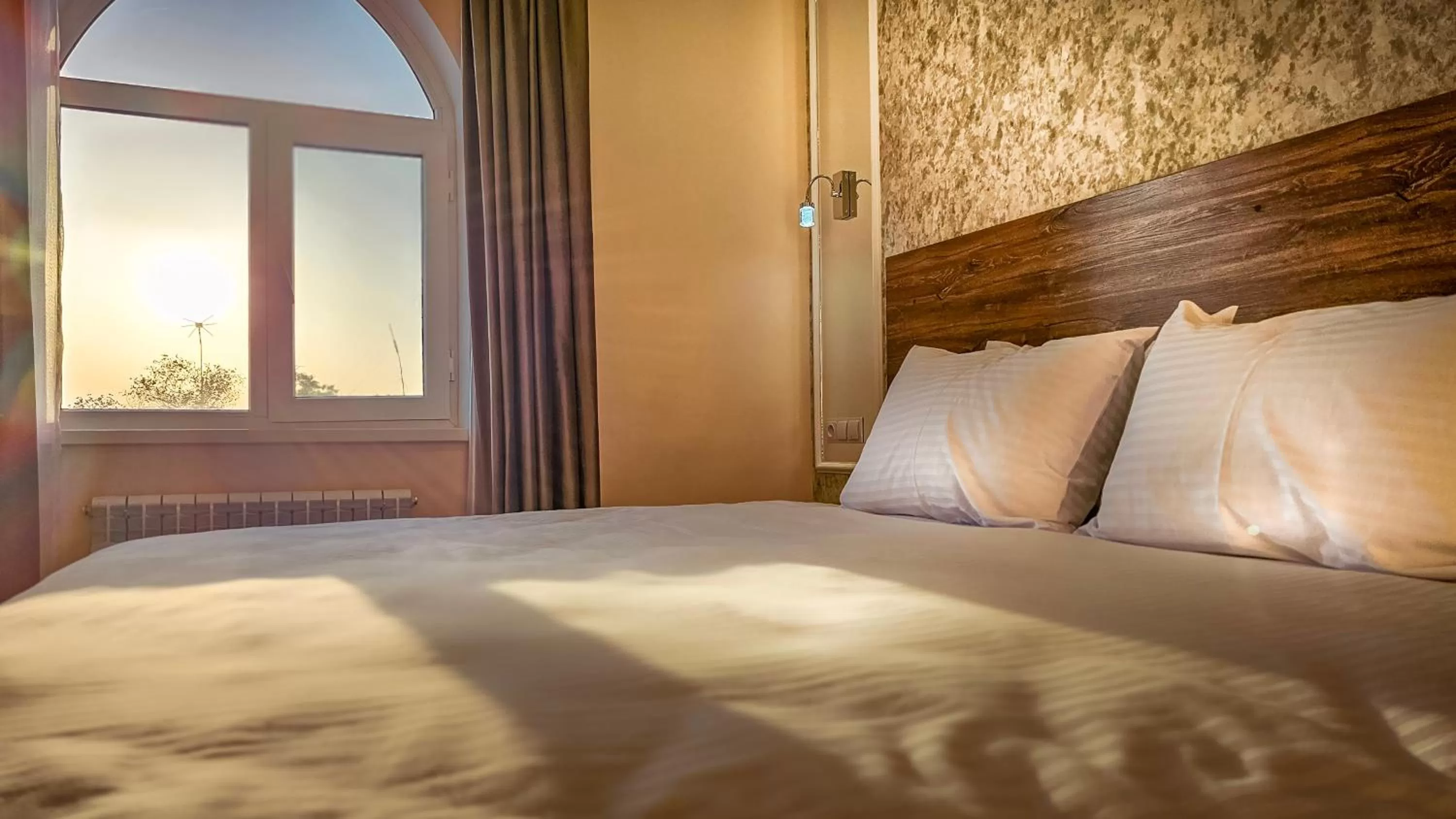 Bed in Hotel Bankir Khiva