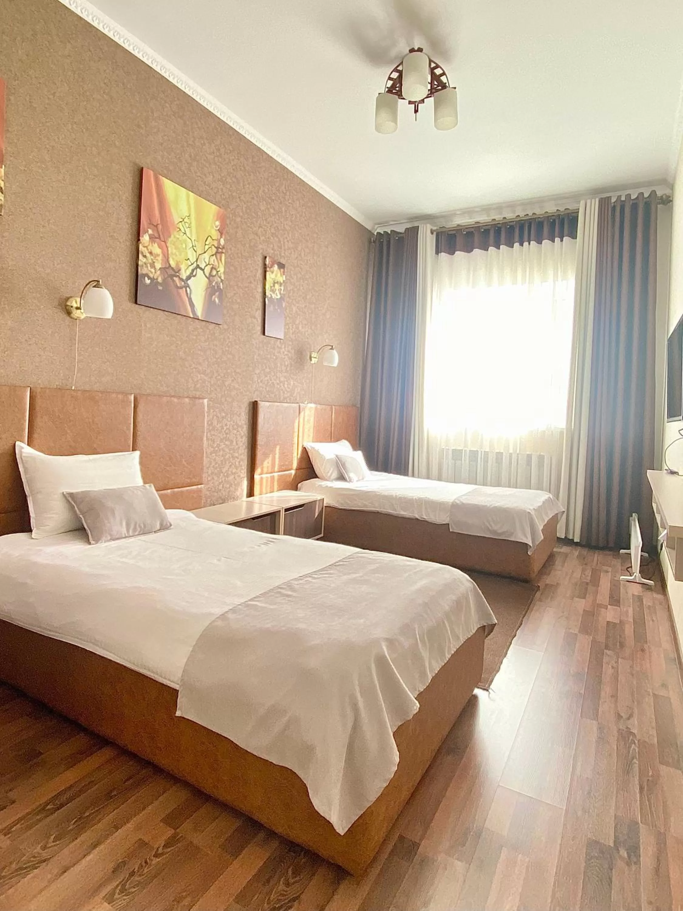 Twin Room in Caravan Hotel