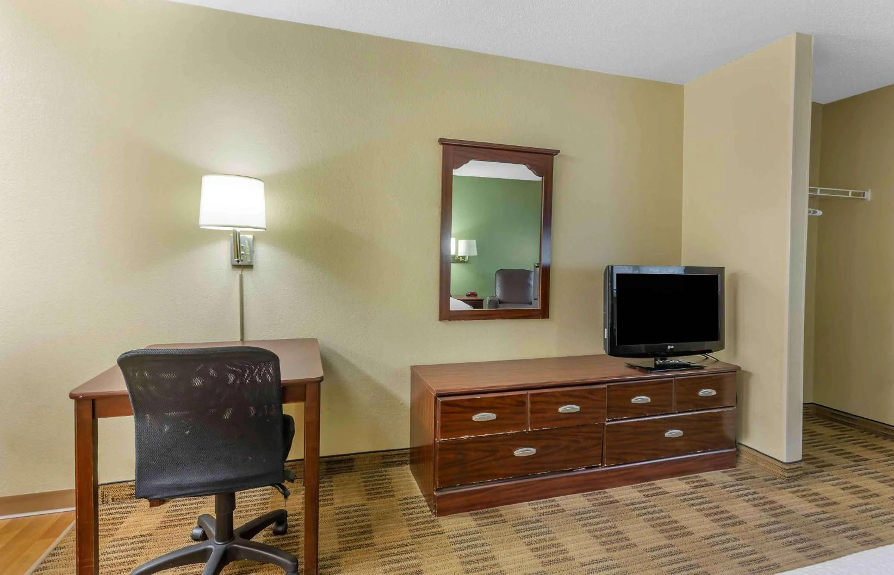 Bedroom in Extended Stay America Select Suites - Greensboro - Wendover Ave - Big Tree Way