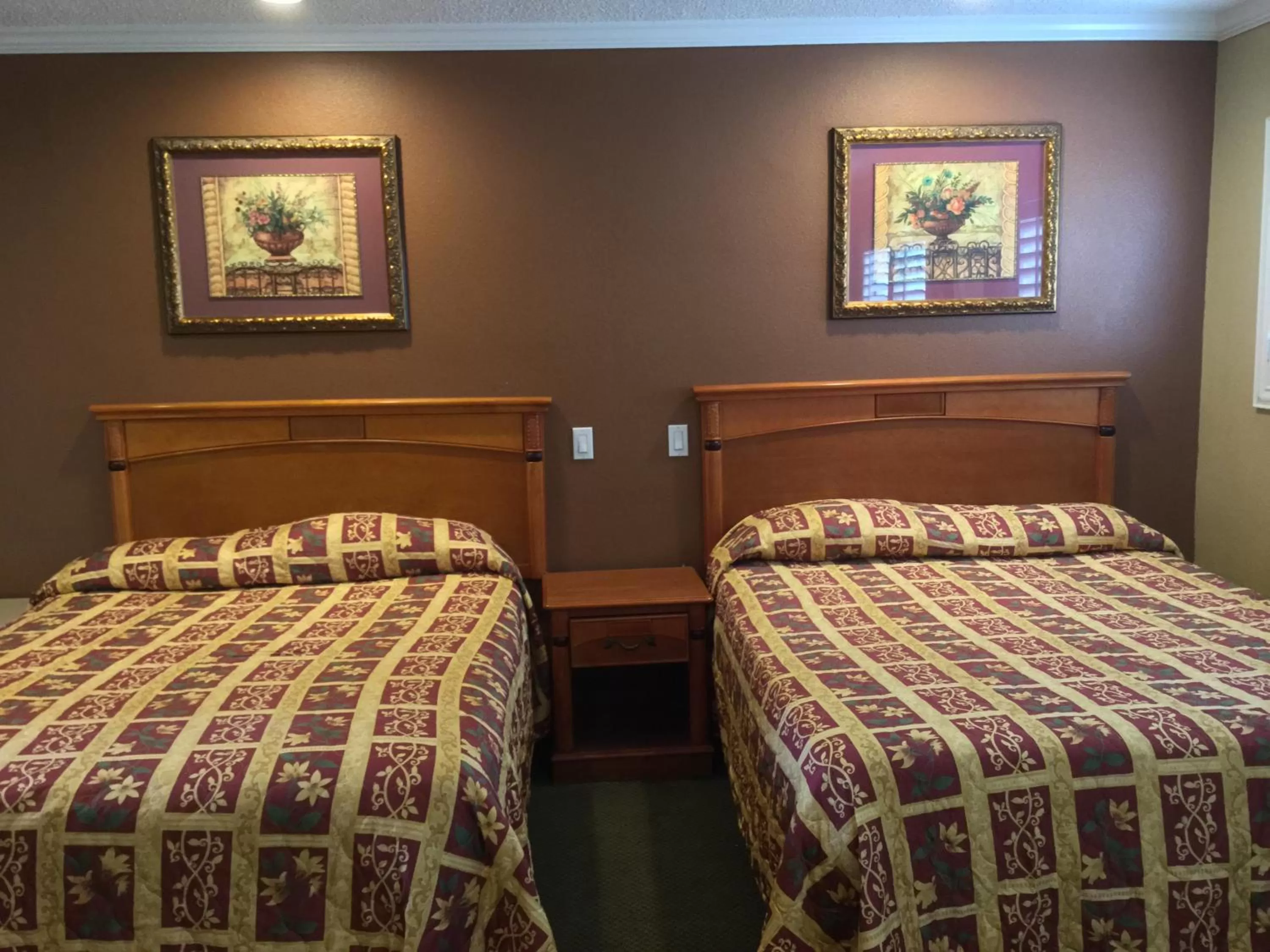 Bed in Bevonshire Lodge Motel