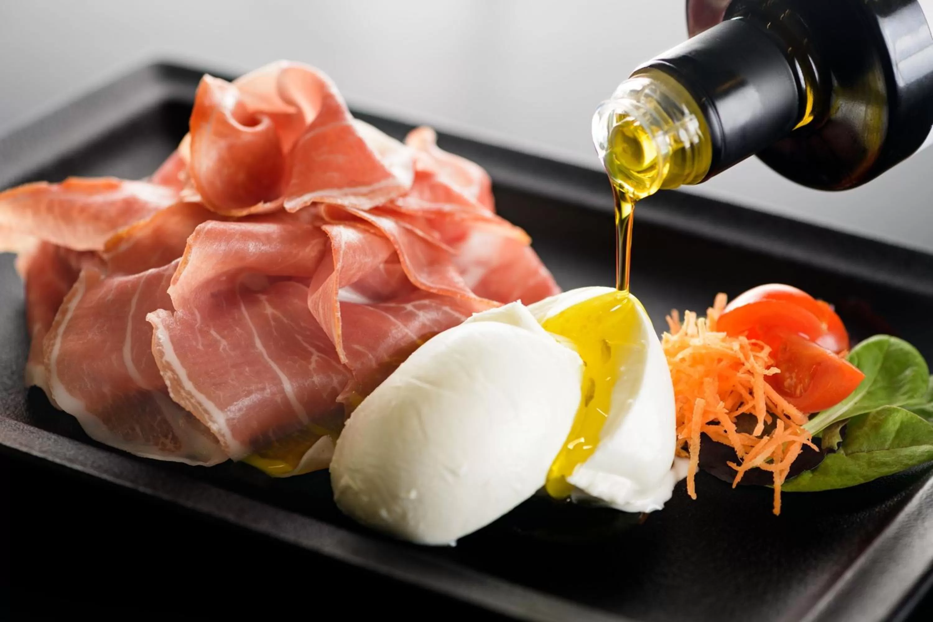 Lounge or bar in AC Hotel Brescia by Marriott