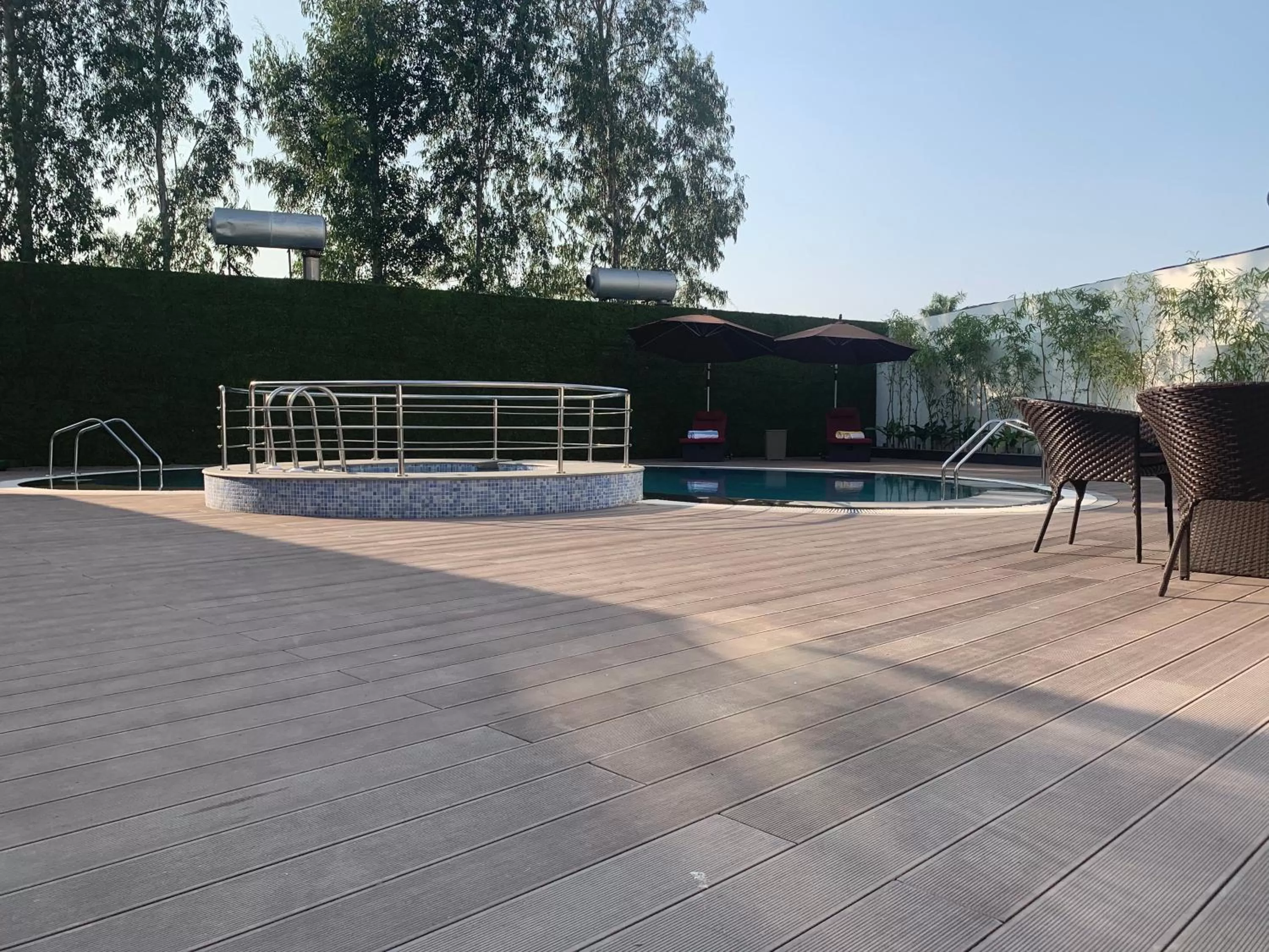 Swimming pool in Country Inn & Suites by Radisson Chandigarh Zirakpur