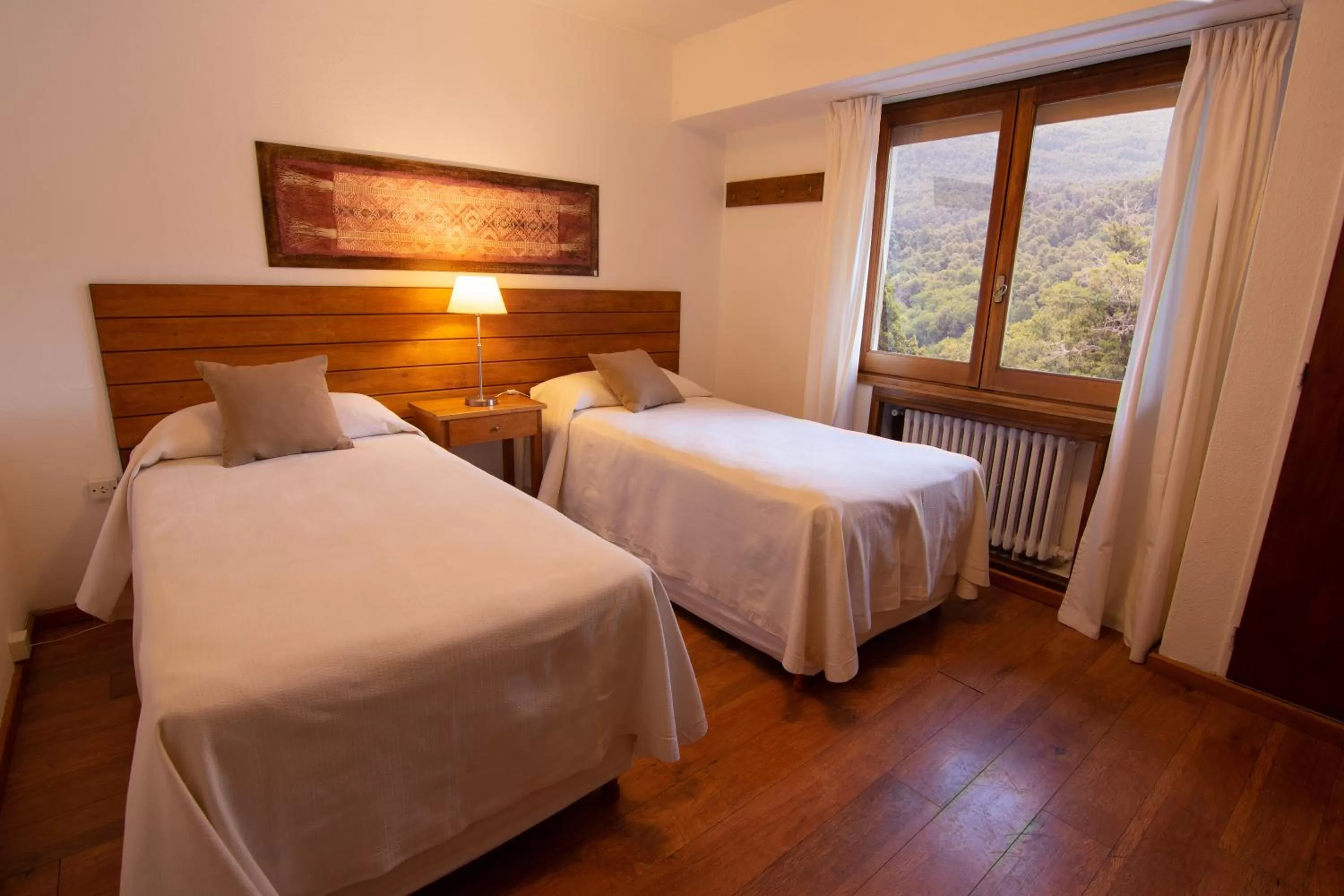 Bed in Hosteria Hostal del Esquiador