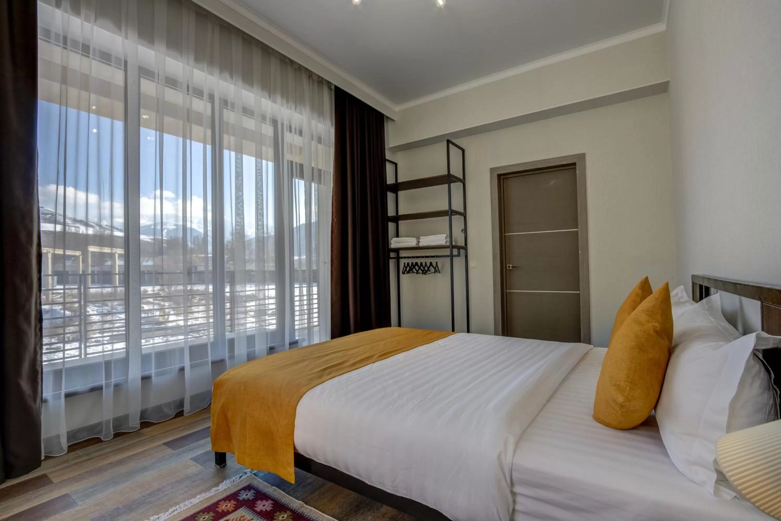 Bed in My hotel Karakol