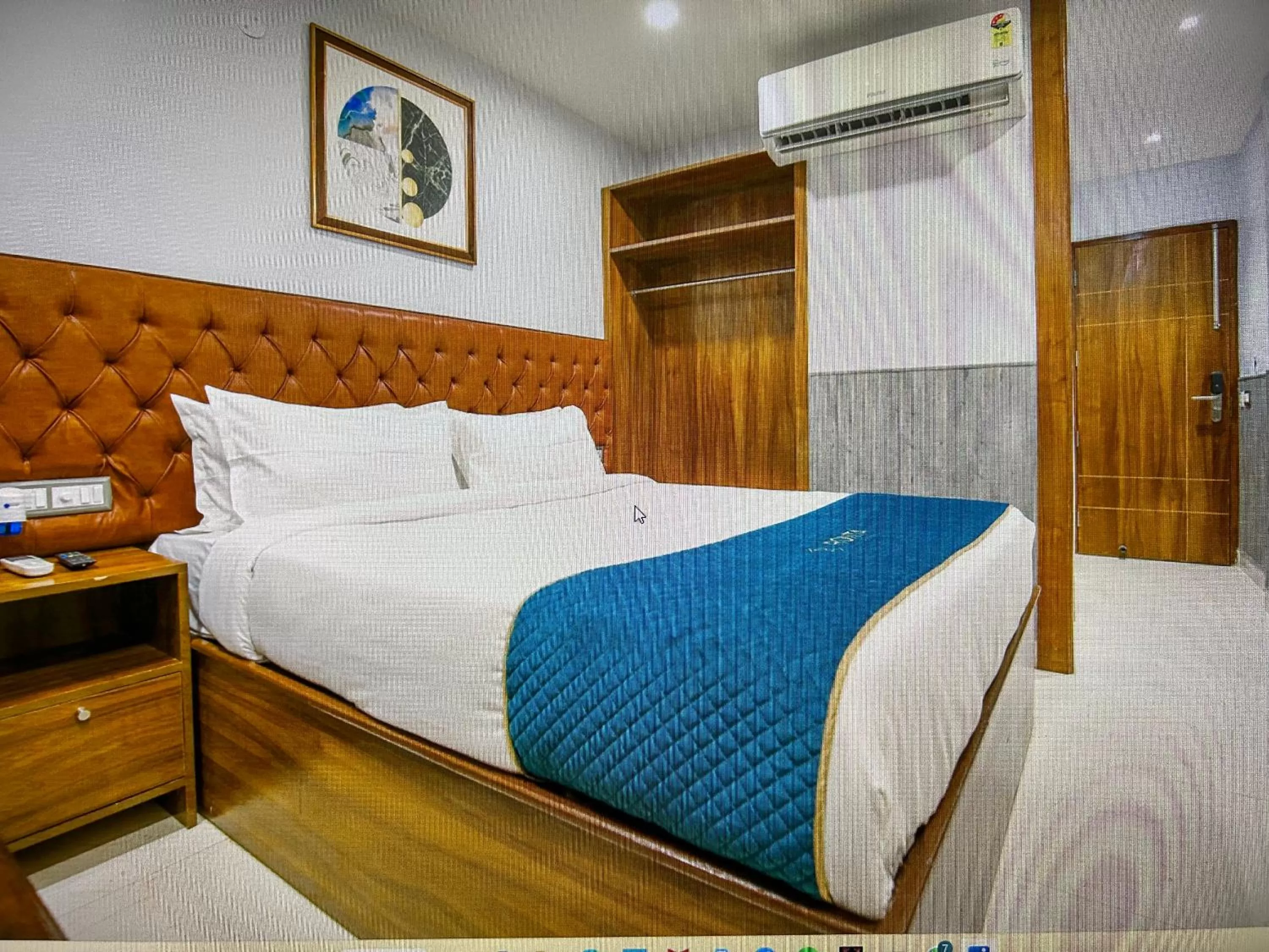 Bed in RONTA WORLD HOTELS