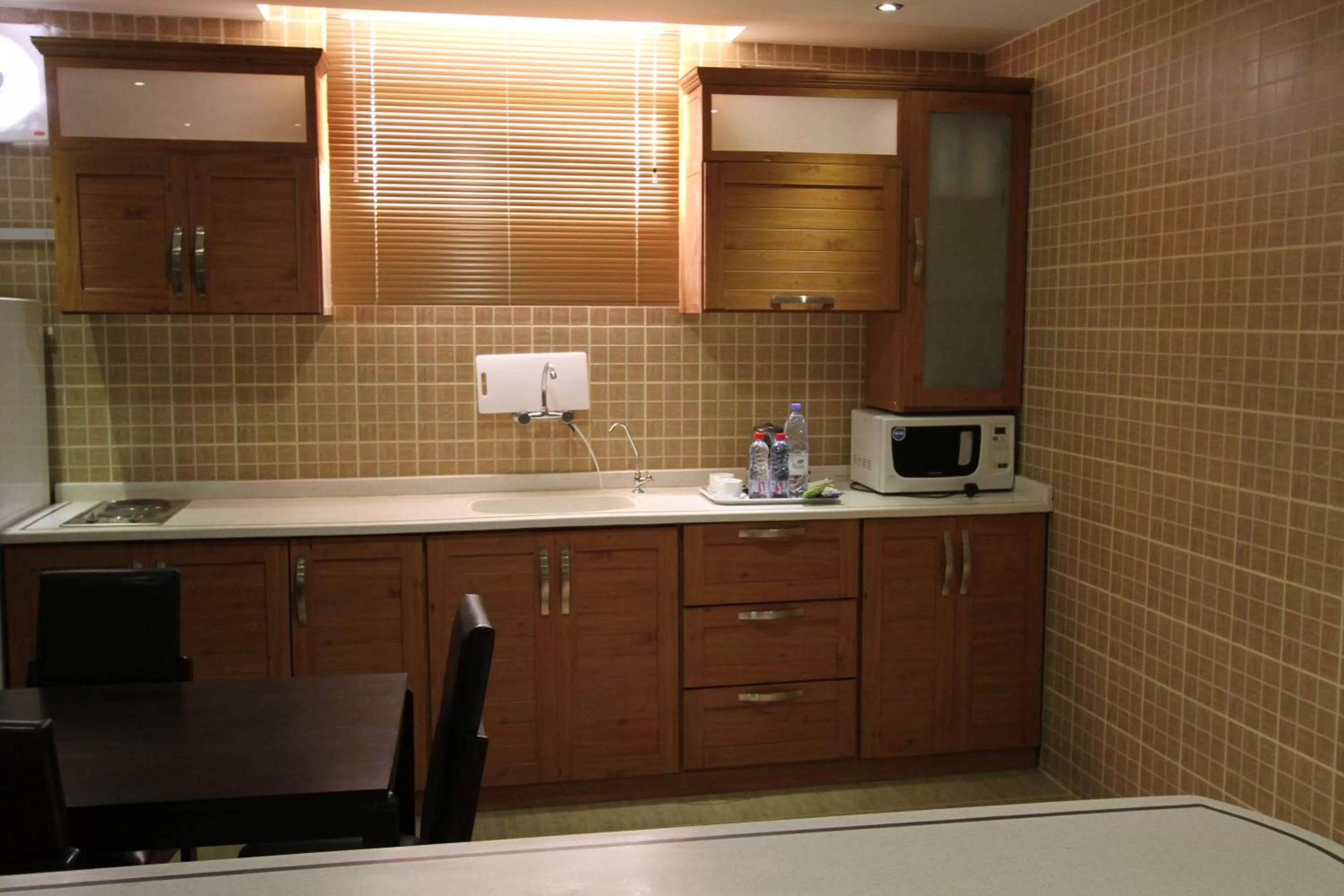 Kitchen or kitchenette, Kitchen/Kitchenette in Manazel Al Hamra Apartment 2