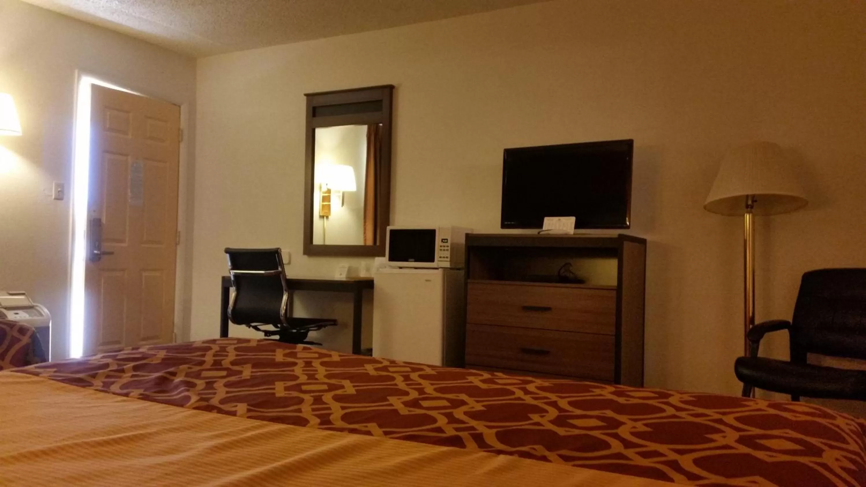 Bed in American Inn Of Liberal