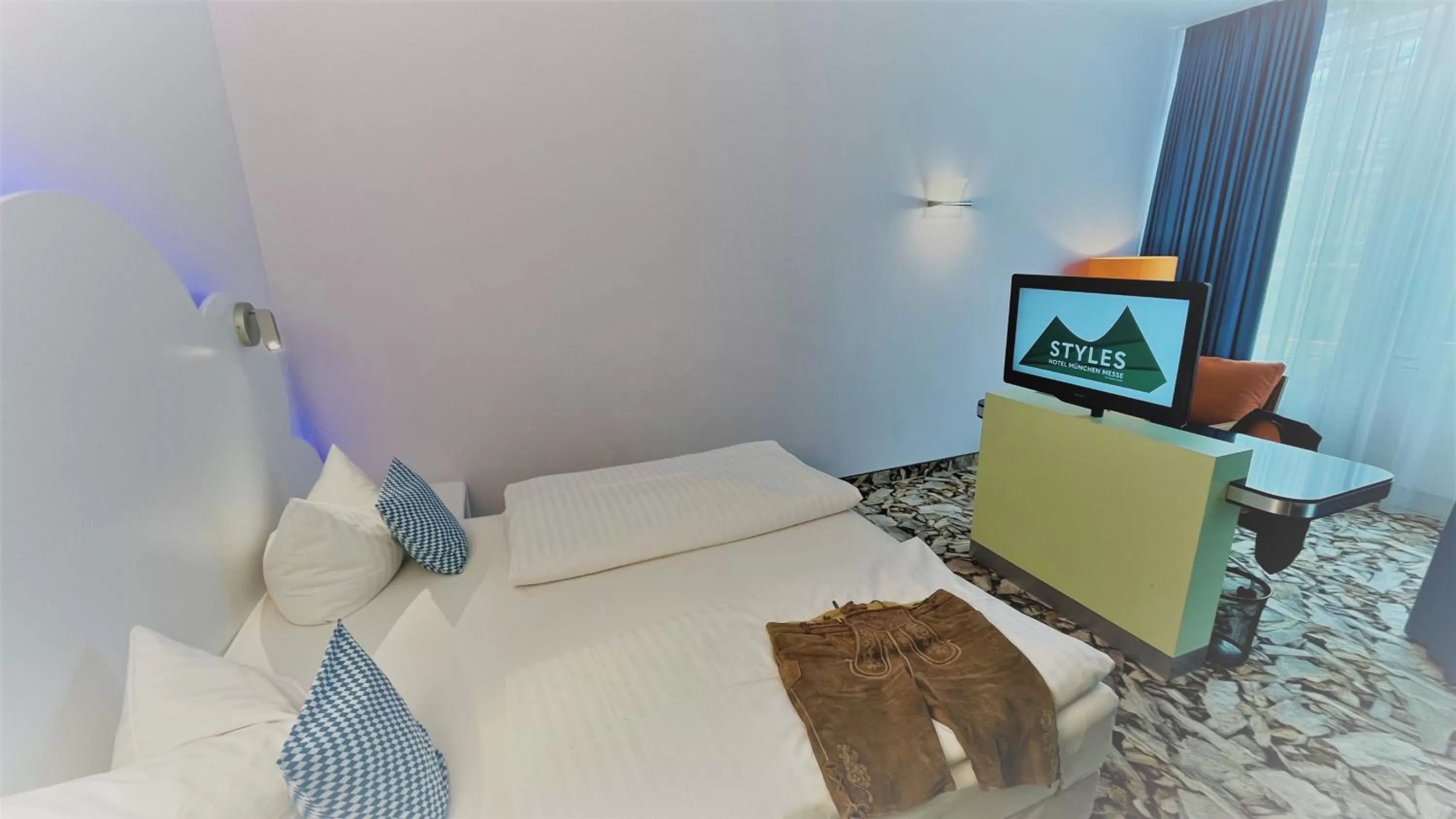 View (from property/room), Bed in Styles Hotel München Messe