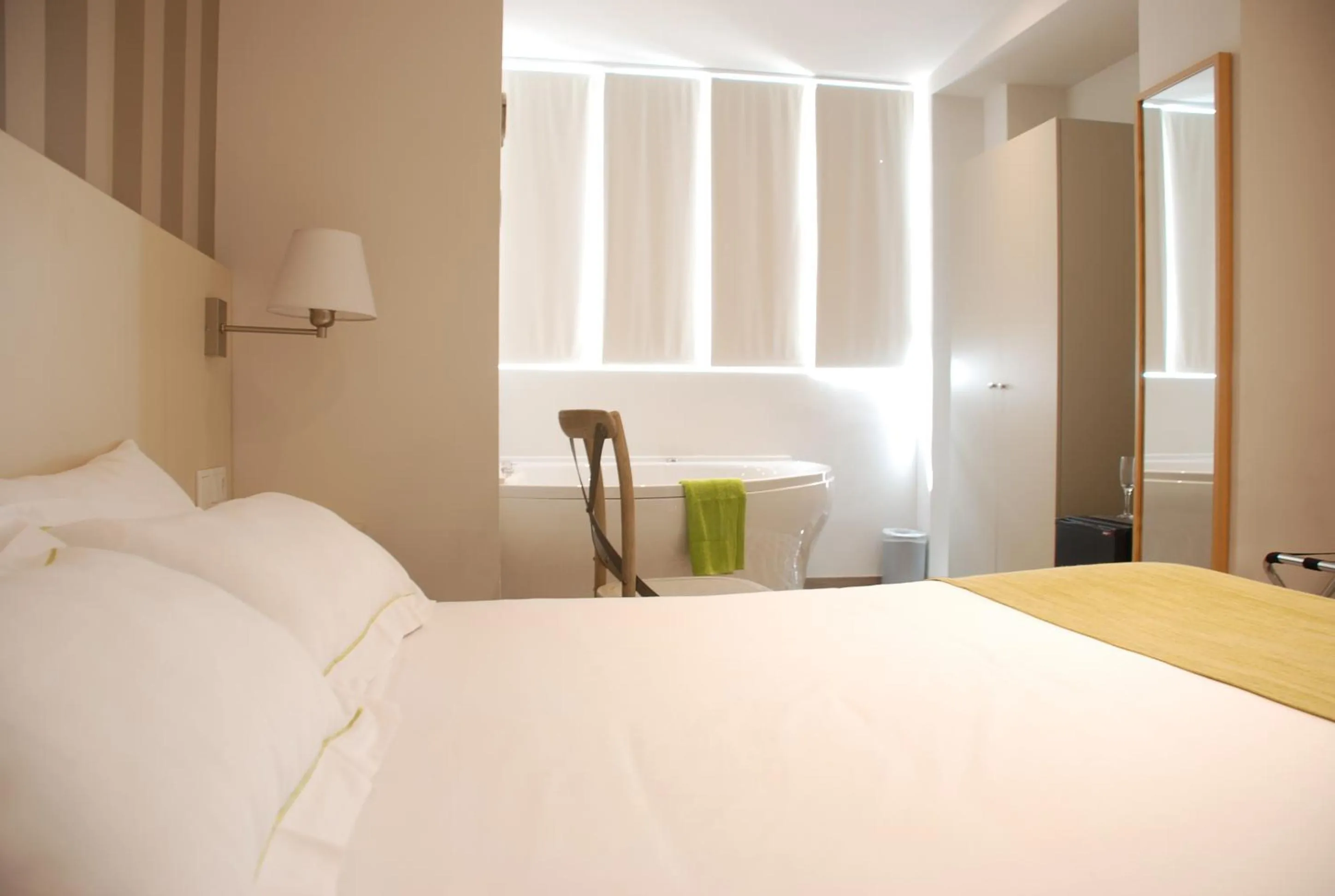 Bed in Hotel San Lorenzo Boutique Plaza