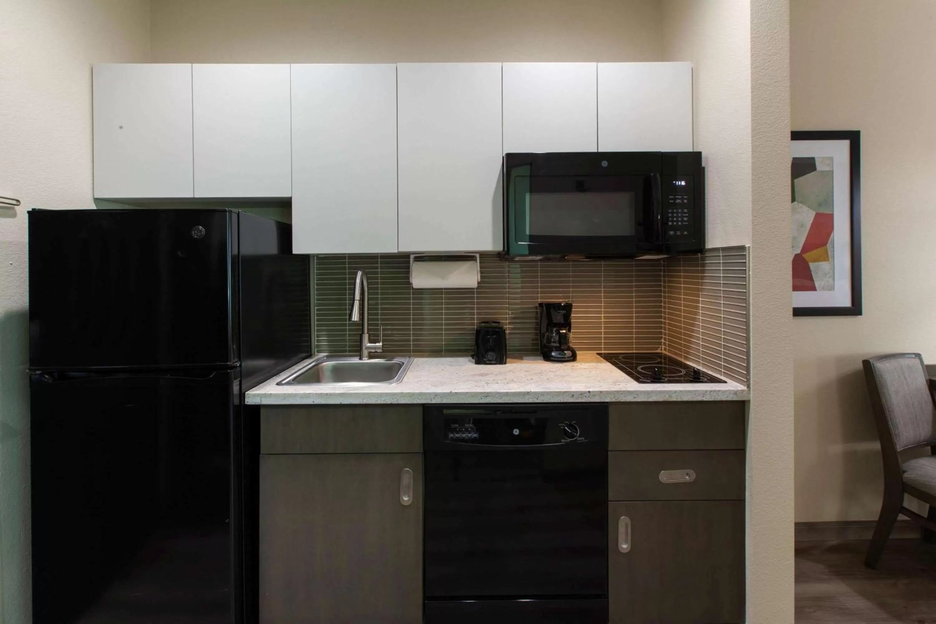 Kitchen or kitchenette in Hawthorn Extended Stay by Wyndham Odessa