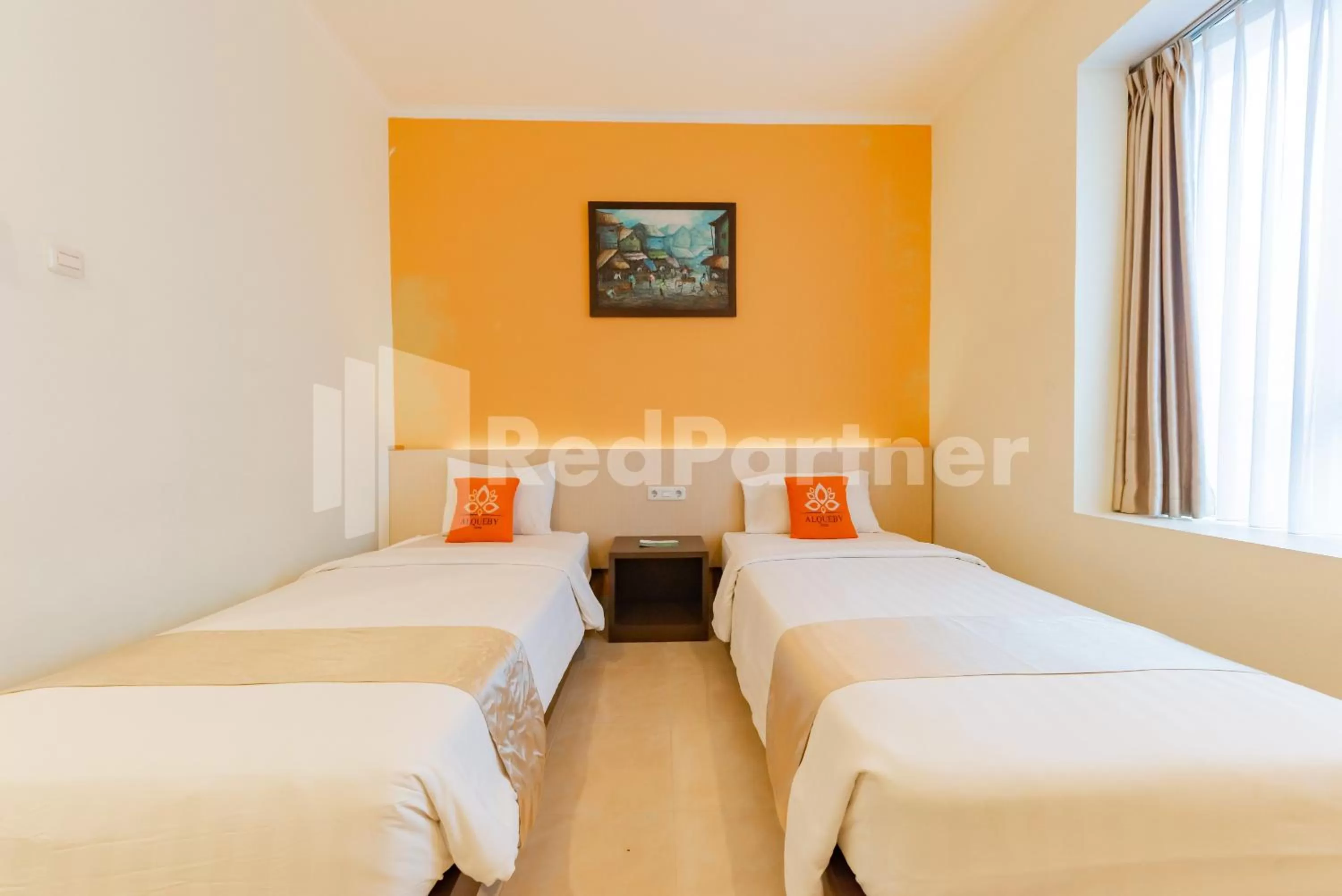 Bedroom, Bed in Alqueby Hotel near Kiara Artha Park & Trans Studio Mall Mitra RedDoorz